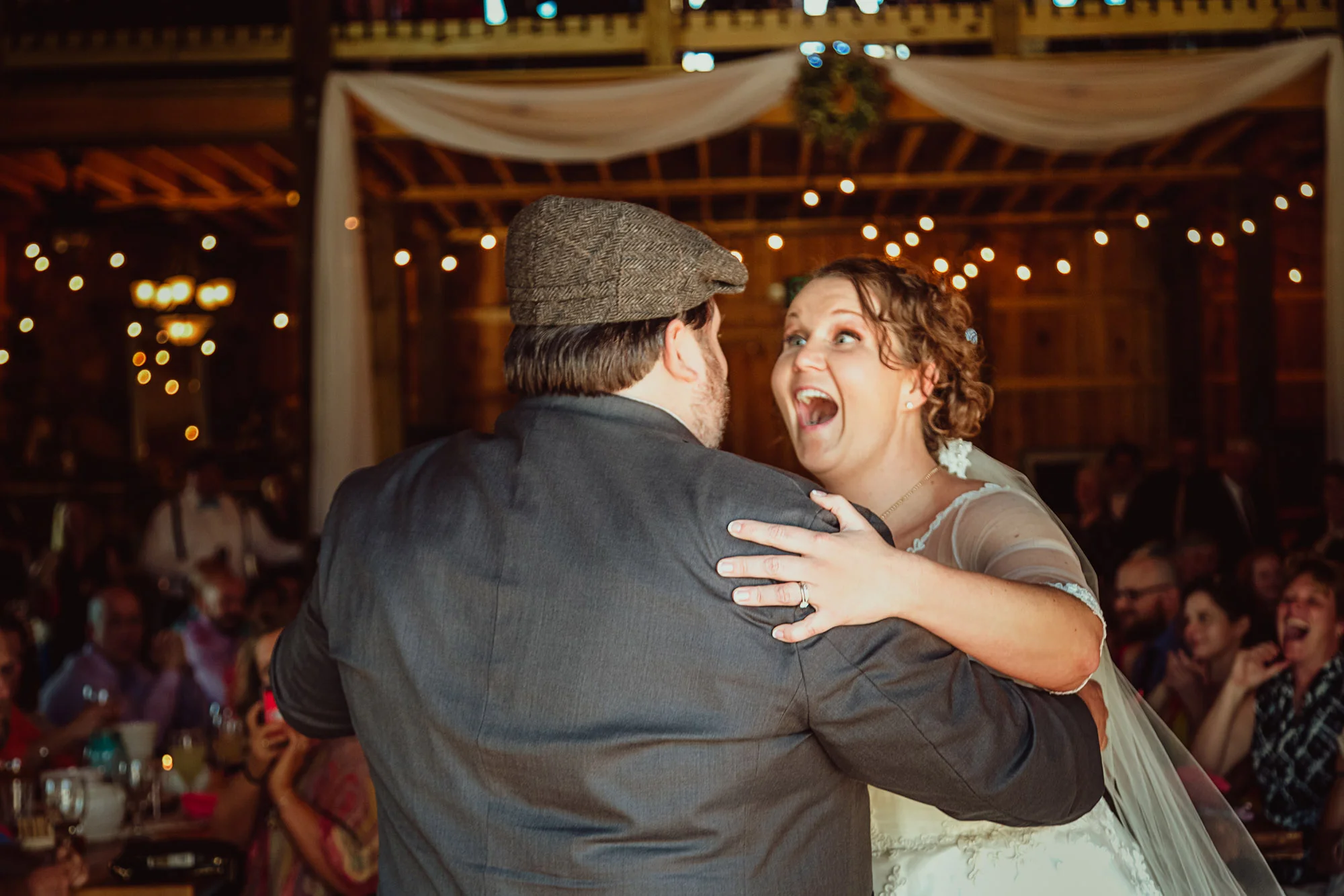 laughing bride and groom dancing.jpg