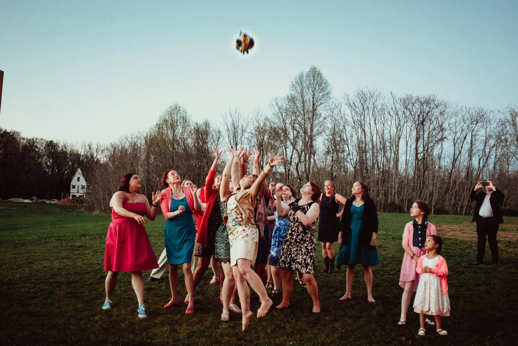 wedding guests and bouquet toss.jpg