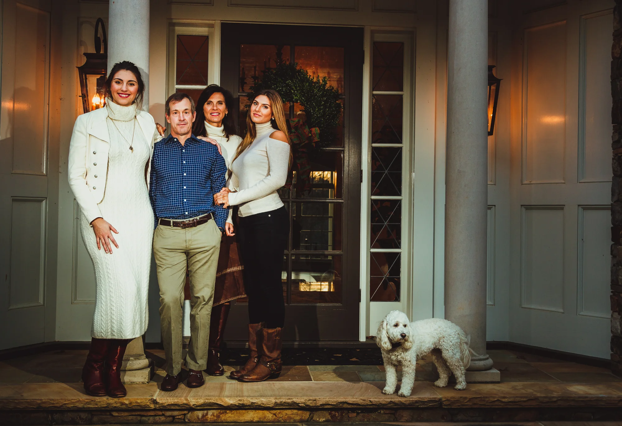 family and dog on a porch.jpg