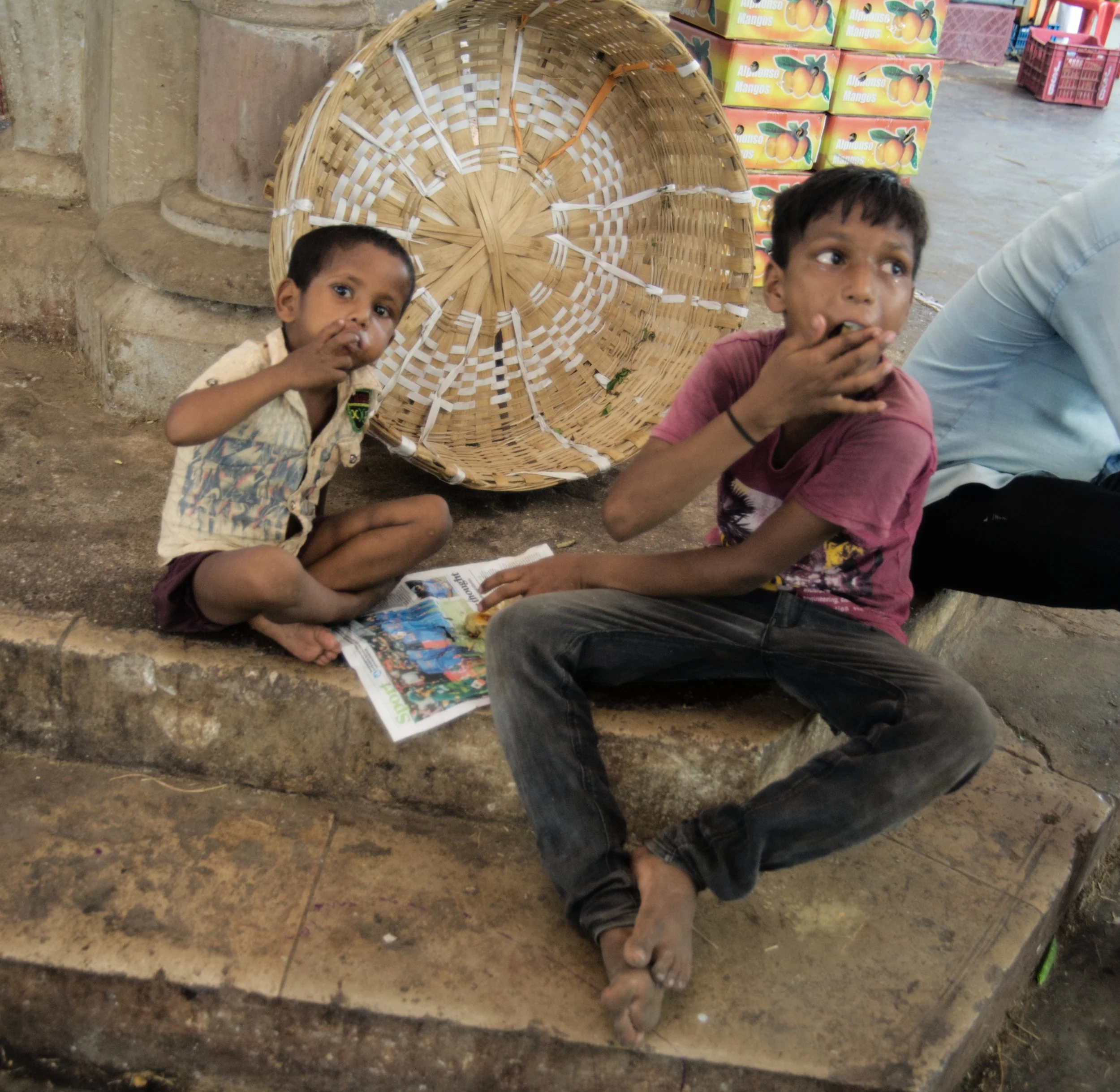 Children Eating in Crawford Market, Mumbai, India.jpg