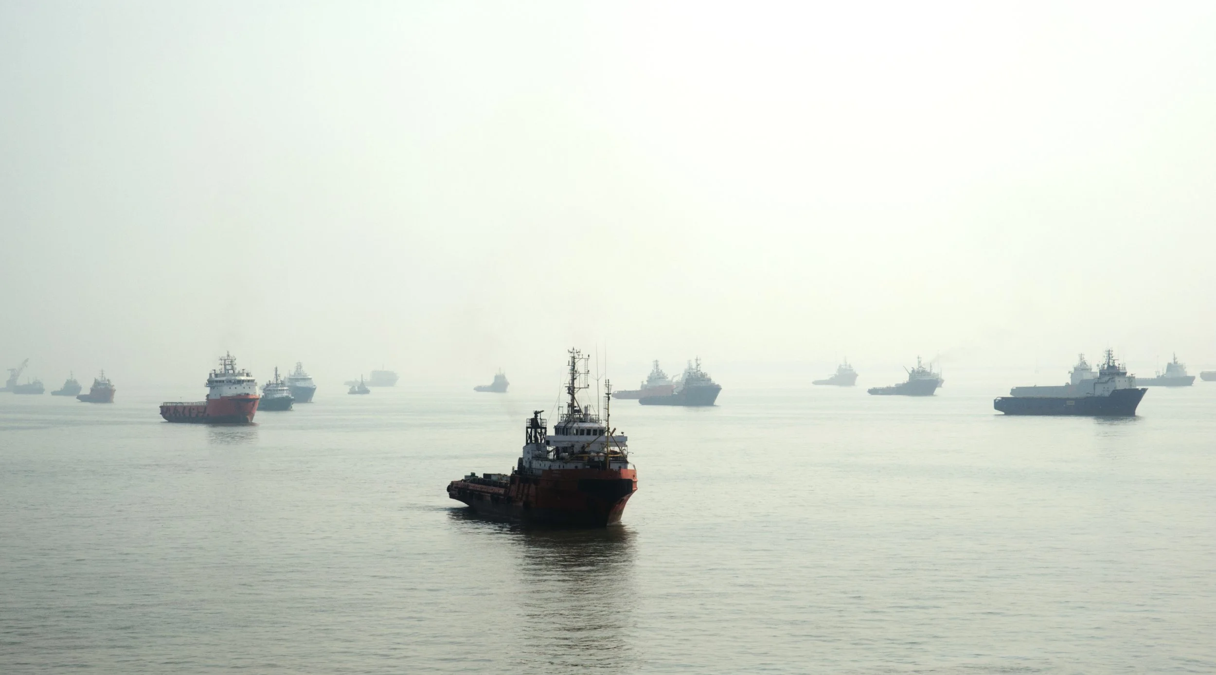 Boats in the Morning Mist, Mumbai.jpg