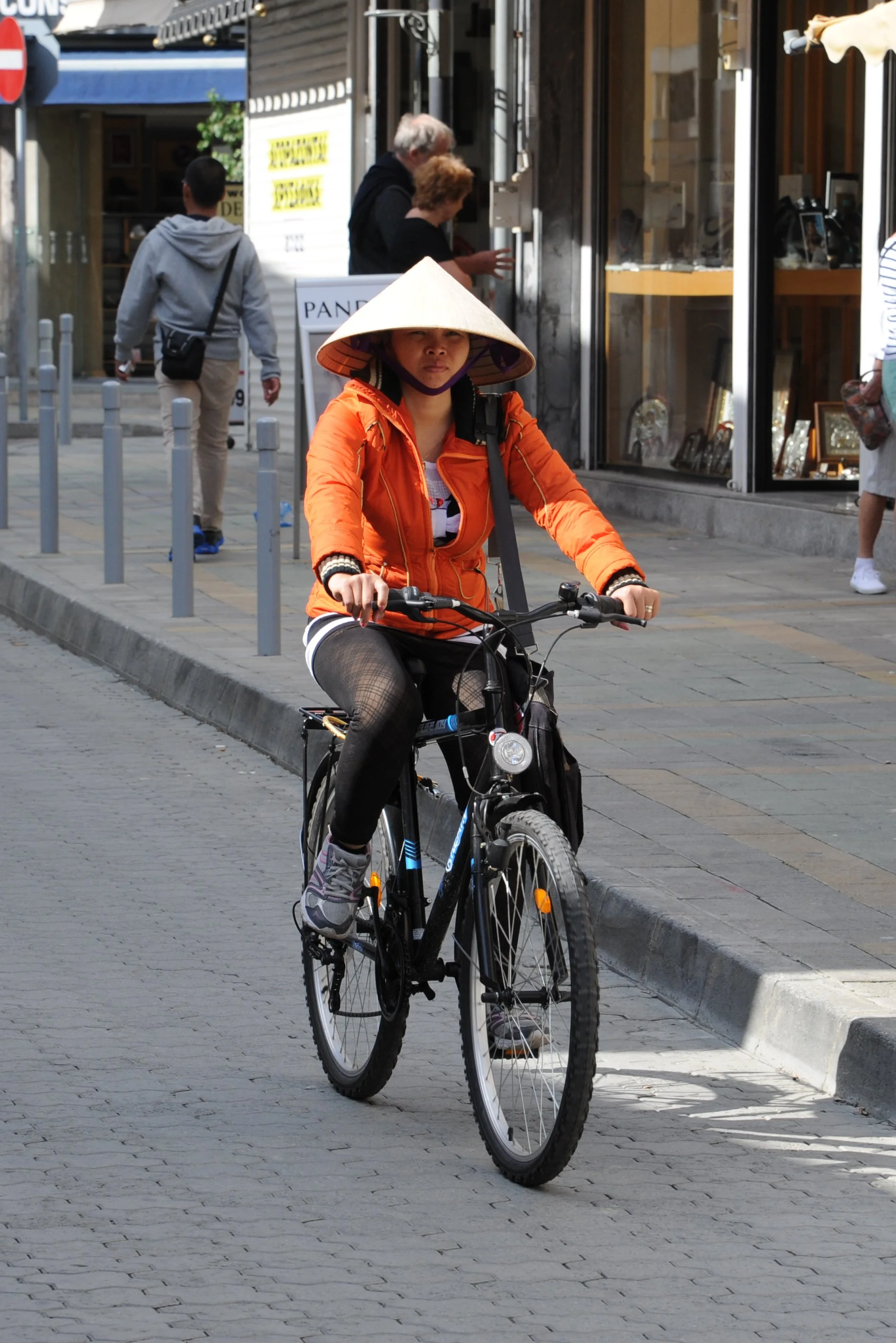 Lady on a Bike, Limassol, Cyprus.jpg
