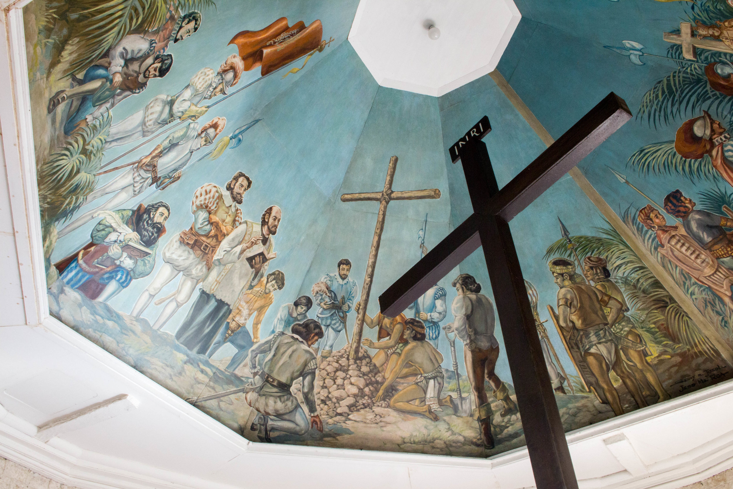 a reconstruction of magellan's cross--the original cross is buried in stone underneath