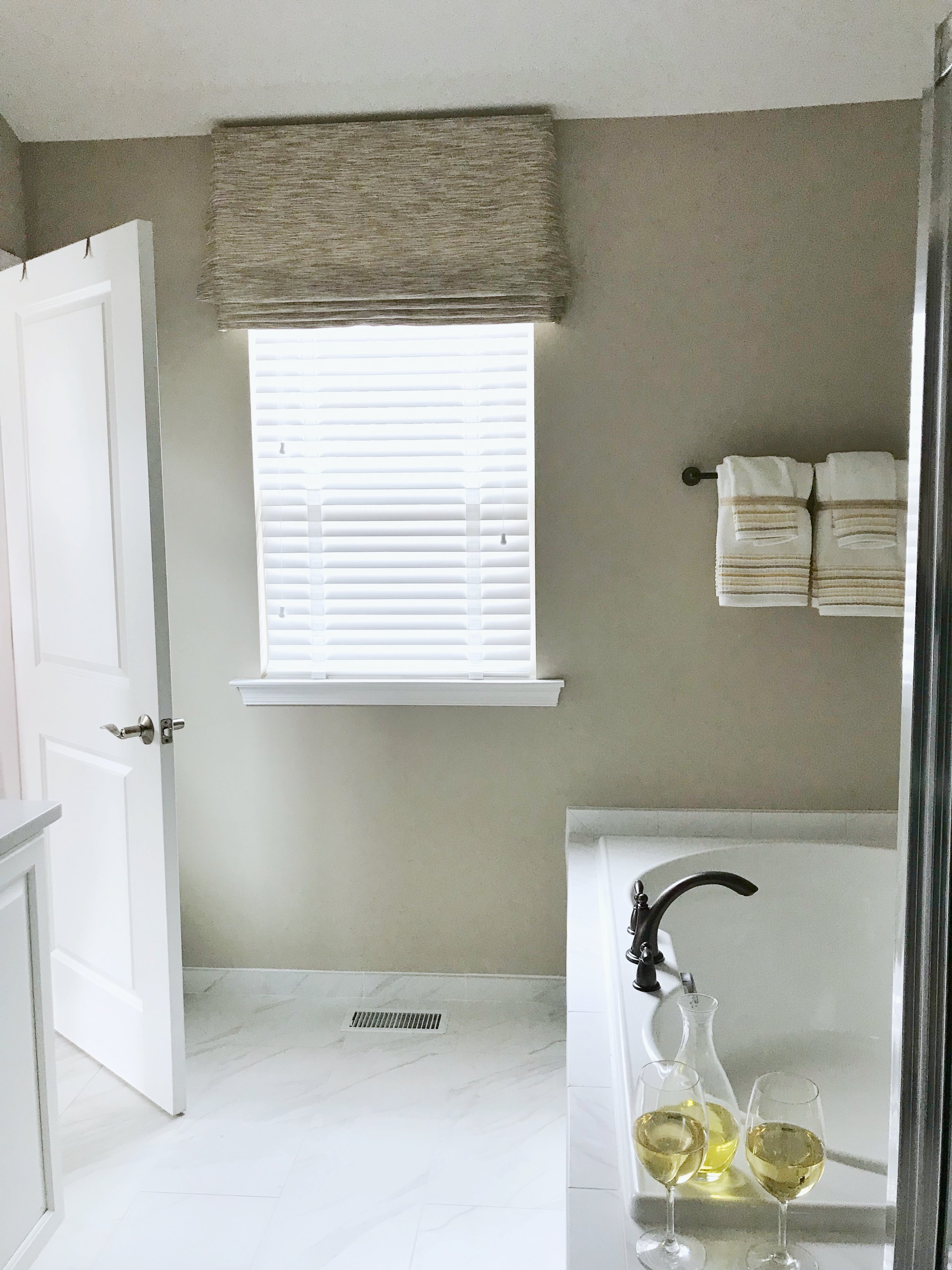 White custom window blinds in master bathroom by 3rdGenBlinds