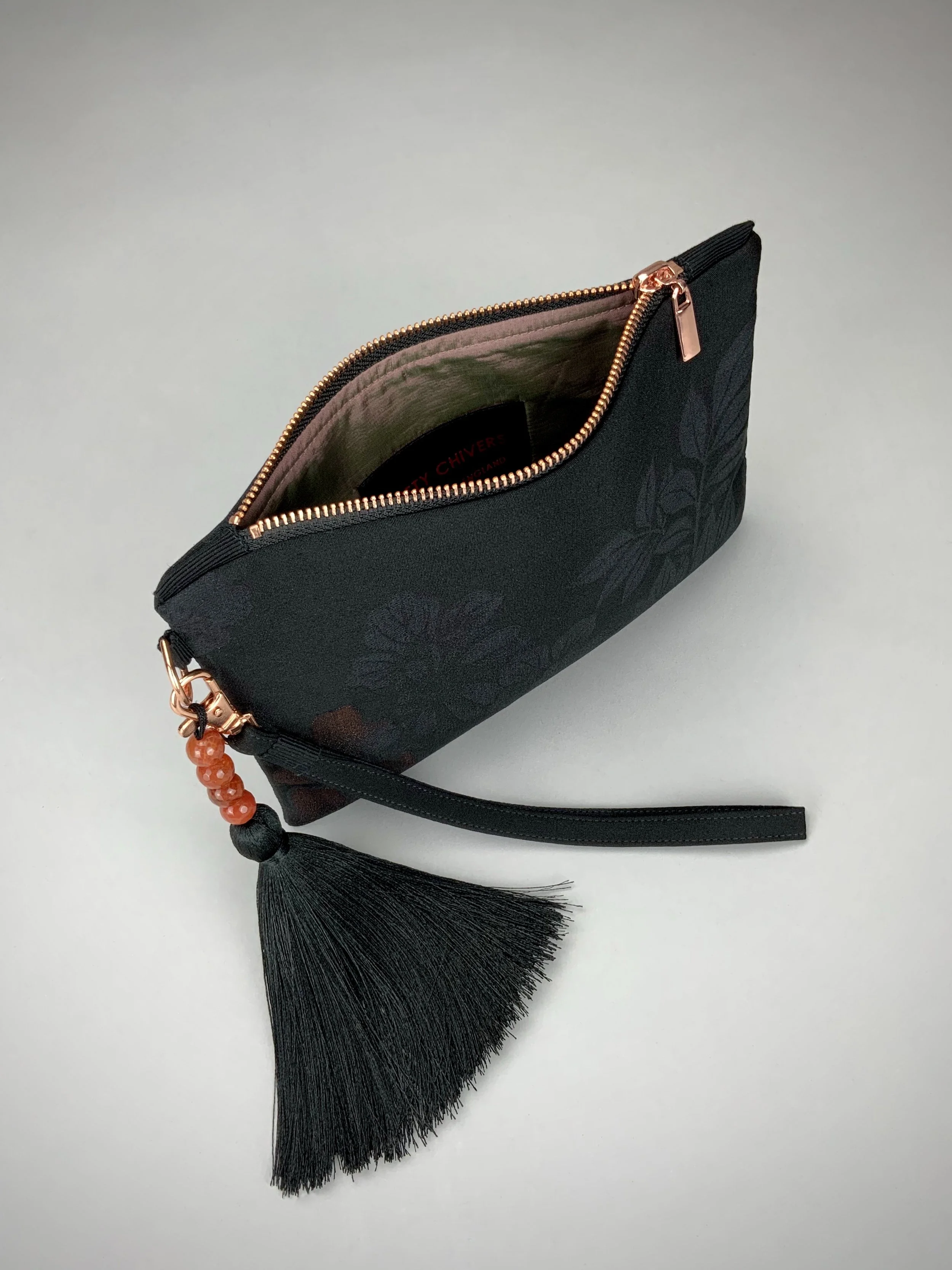 Black silk wristlet purse with blossom flower design & silk tassel, made from vintage Japanese kimono fabric by Kirsty Chivers