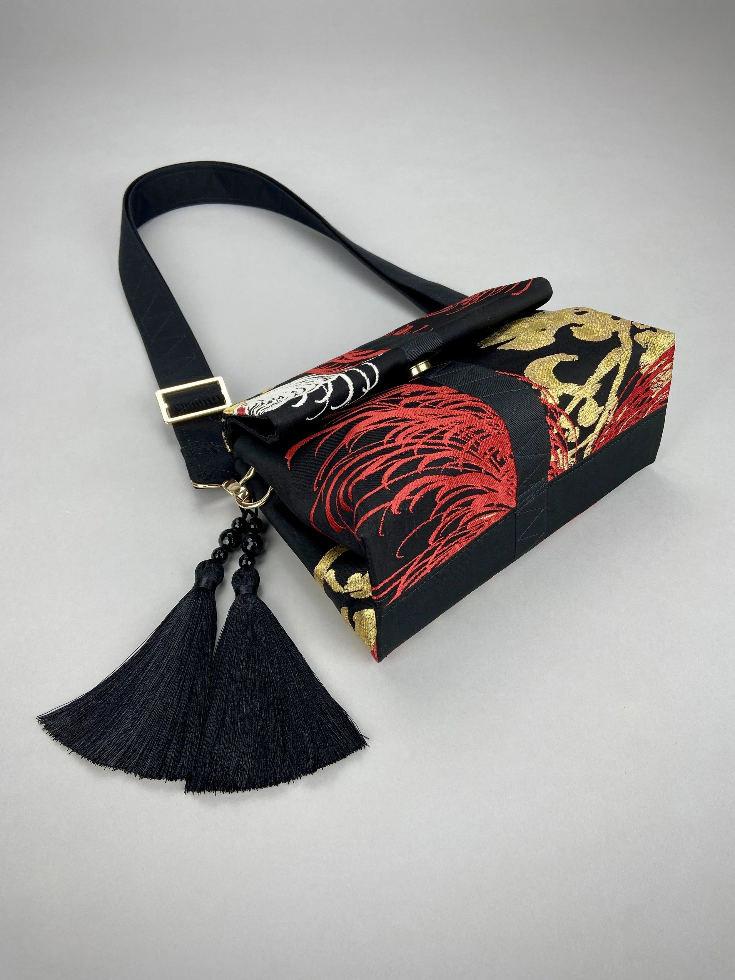 Black Chrysanthemum vintage obi silk and rayon fold bag with gold hardware and black silk tassel charm by Kirsty Chivers
