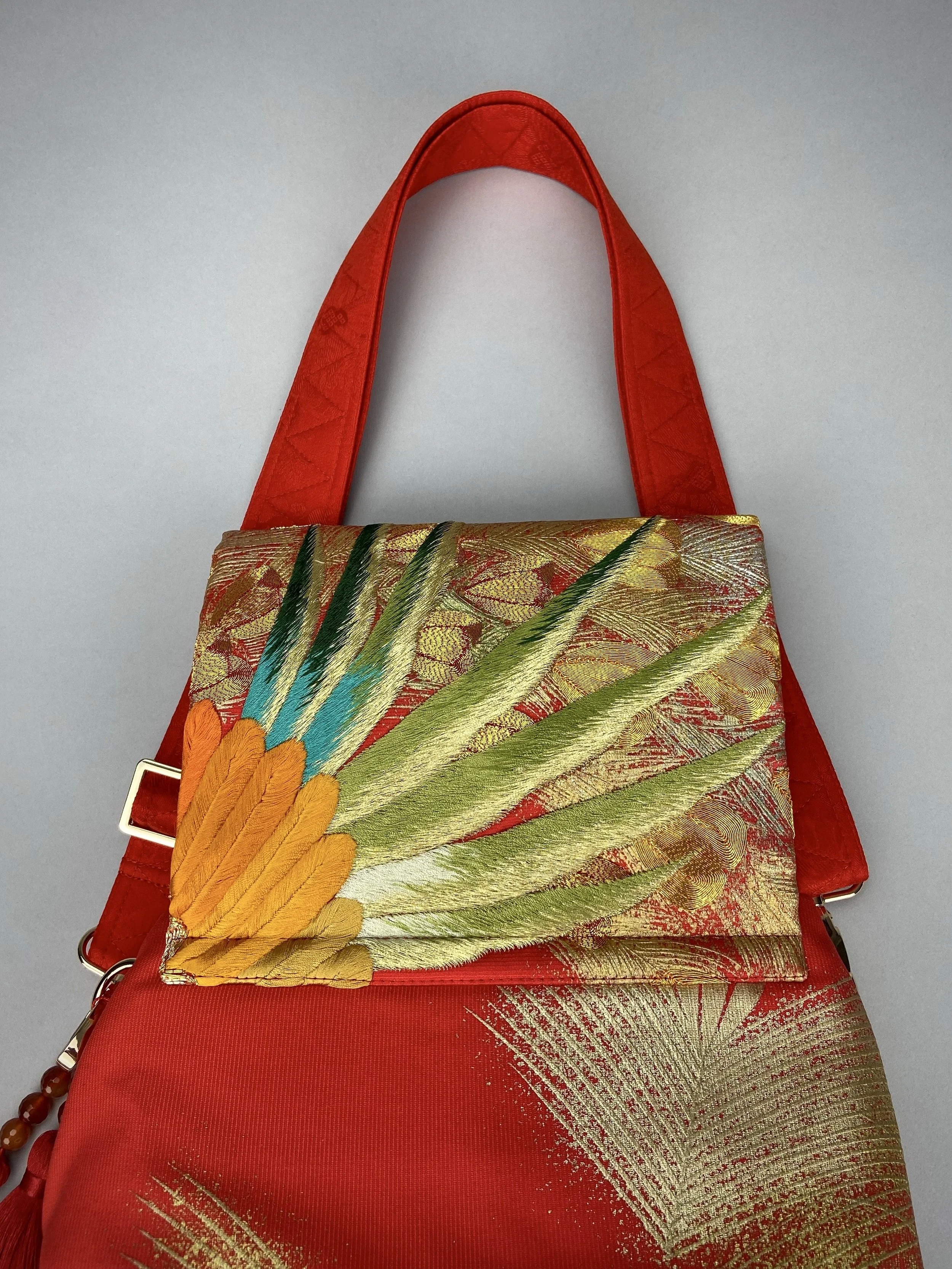 Vermillion red vintage kimono silk evening bag with gold Peacock feather design, Agate beaded tassel charm by Kirsty Chivers