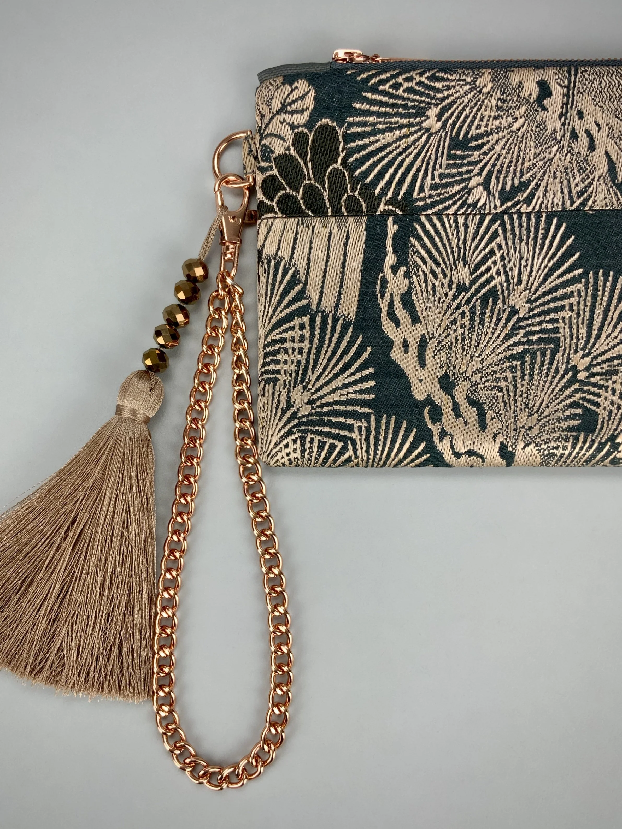 Closeup of unique evening clutch purse with tassel, made from vintage Japanese obi fabric