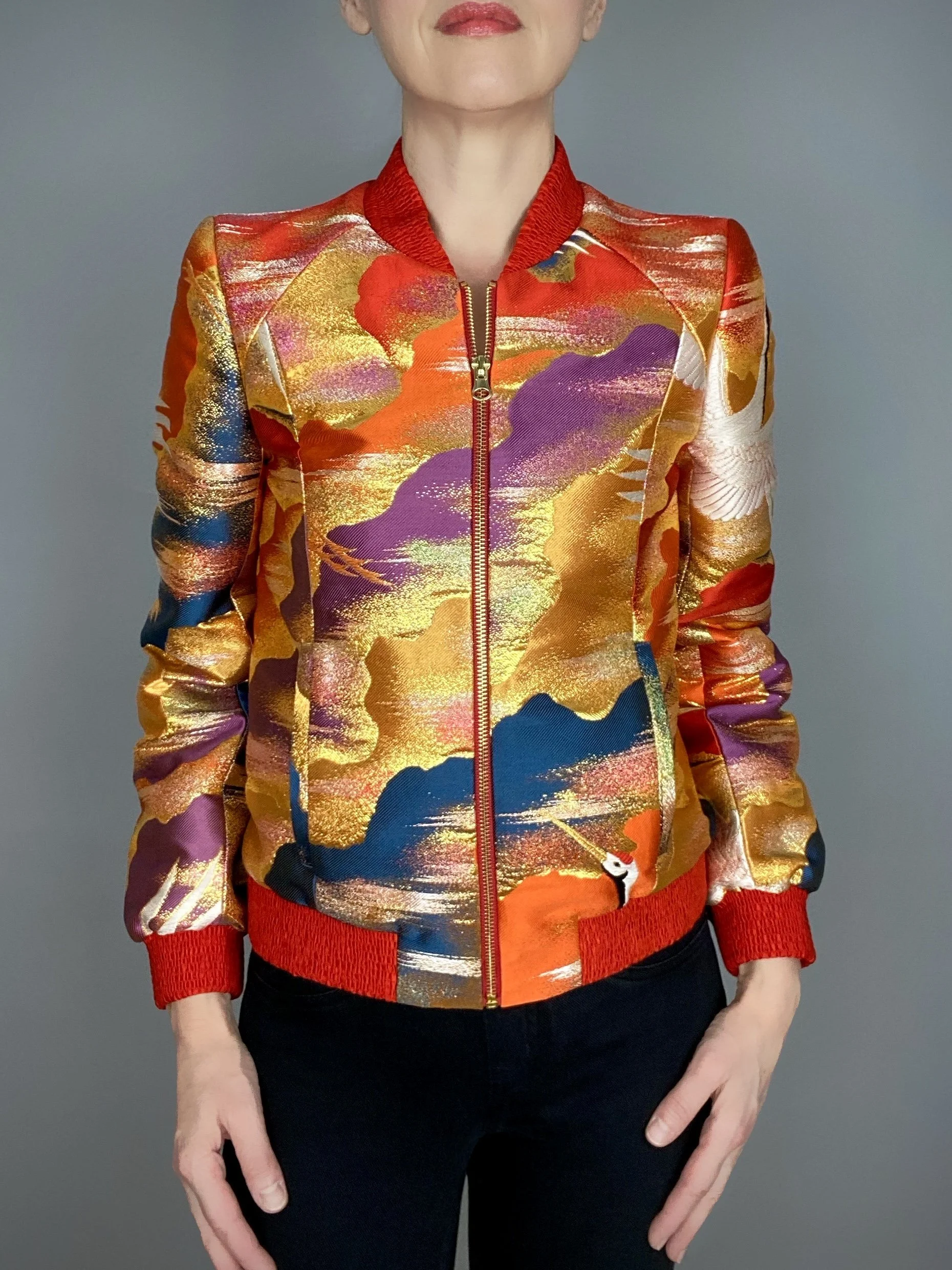 One-of-a-kind vermillion red bomber jacket crafted from vintage Japanese kimono silk