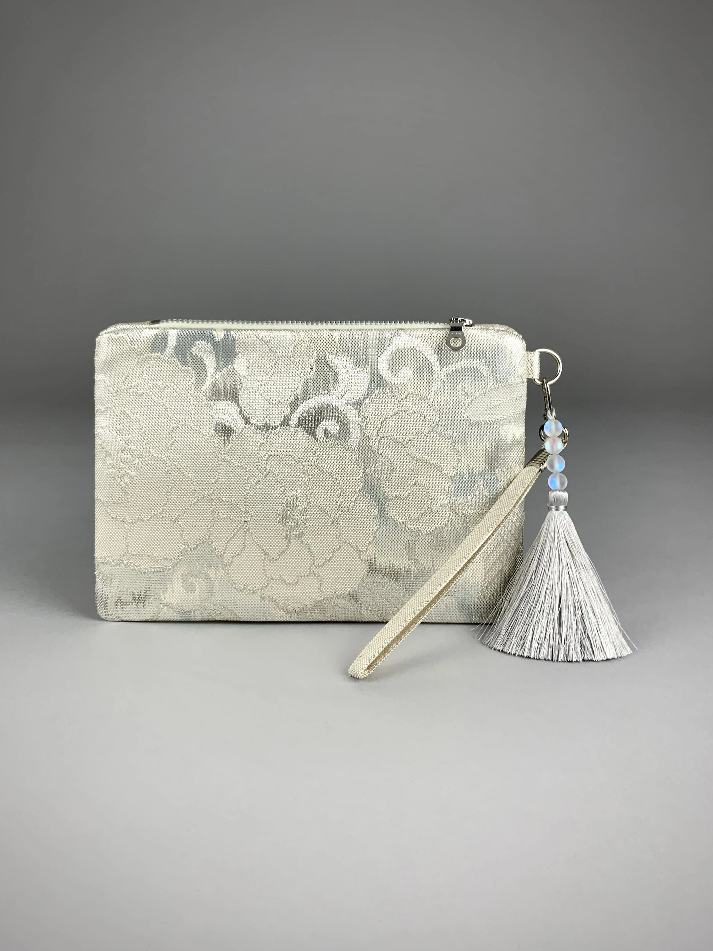 silver clutch purse with tassel and moonstone beads, made from vintage Japanese obi silk