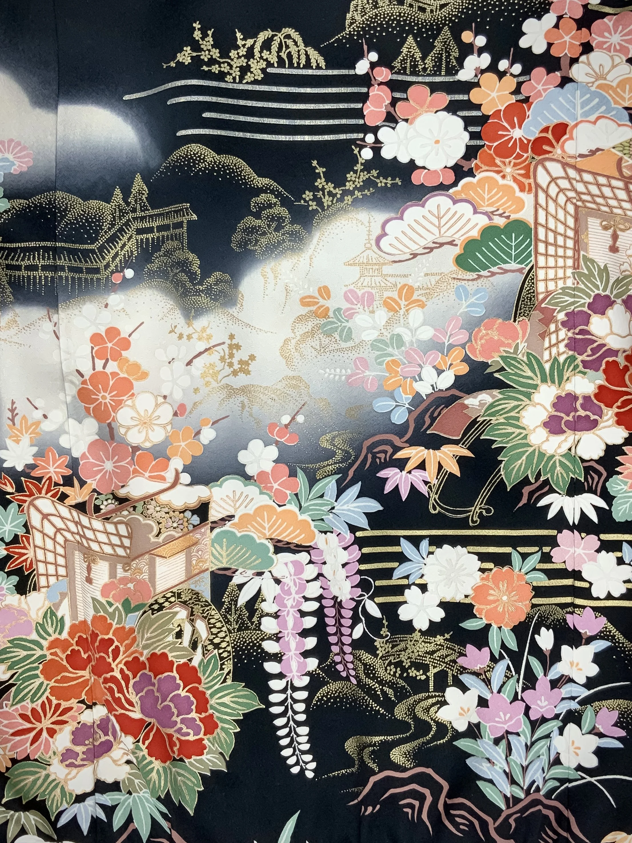 Closeup of unique black printed bomber jacket handmade using vintage Japanese Furisode kimono silk