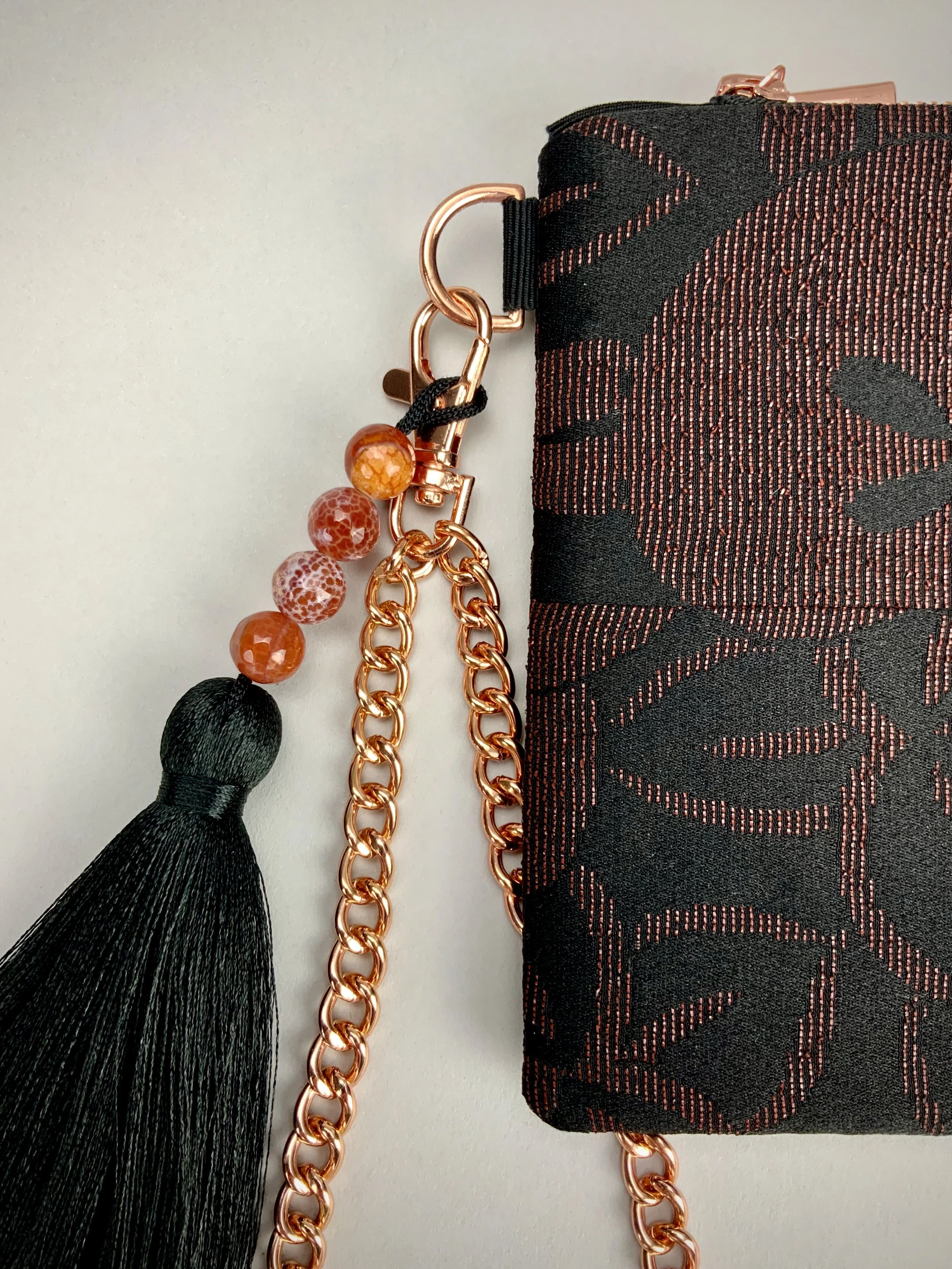 Black silk wristlet purse with glittery Persimmon fruit design & silk tassel, made from vintage Japanese kimono fabric by Kirsty Chivers