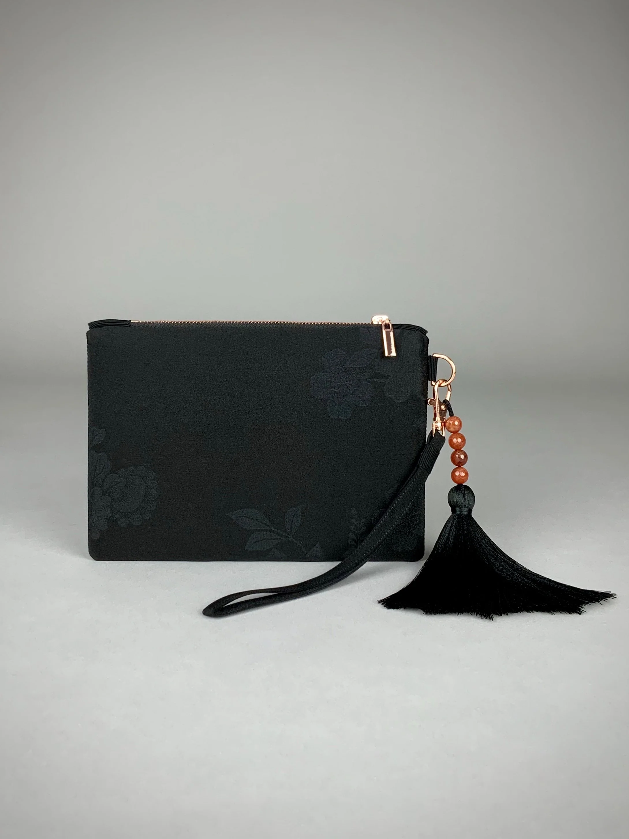 Black silk wristlet purse with blossom flower design & silk tassel, made from vintage Japanese kimono fabric by Kirsty Chivers