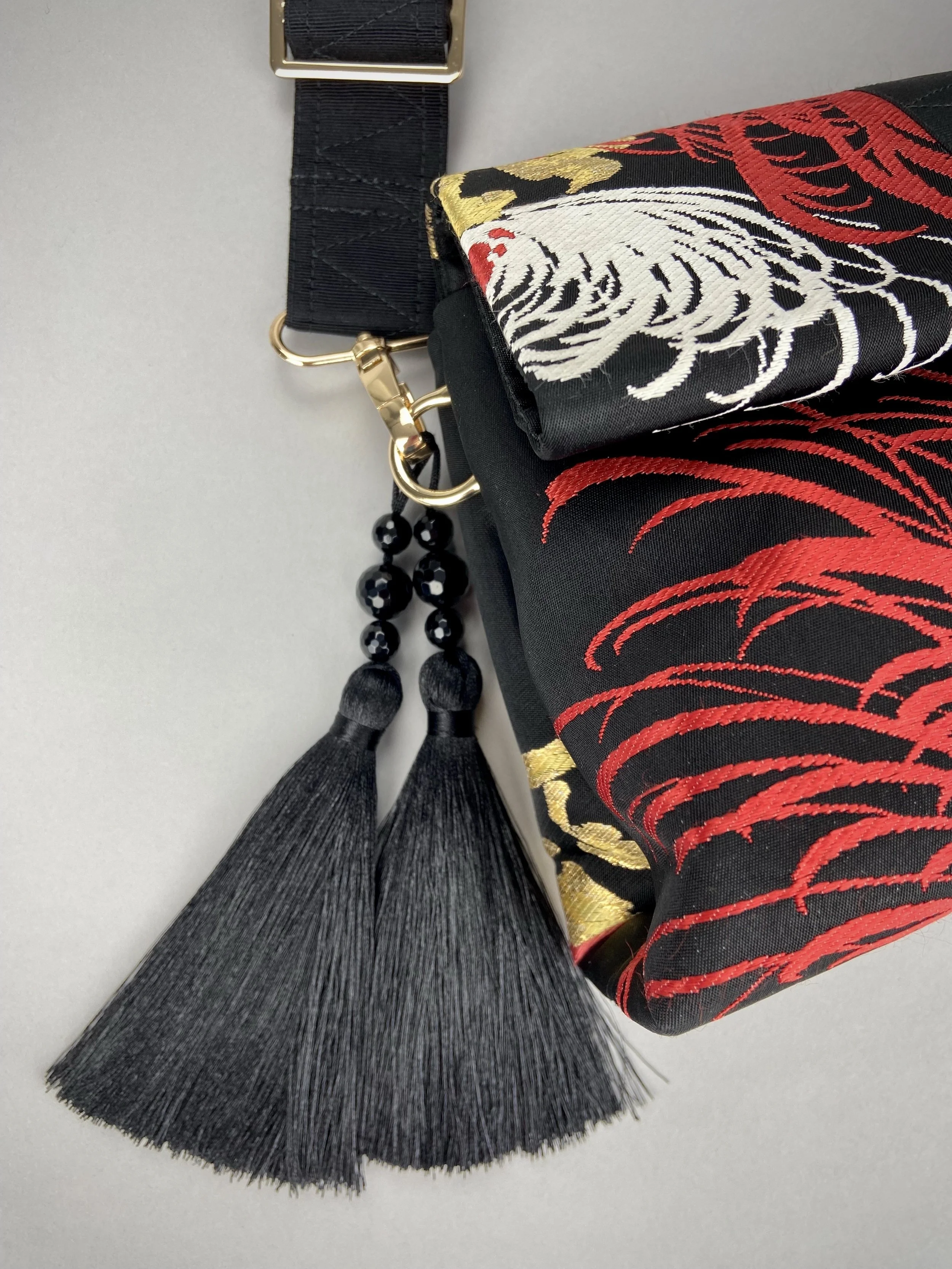 Black Chrysanthemum vintage obi silk and rayon fold bag with gold hardware and black silk tassel charm by Kirsty Chivers
