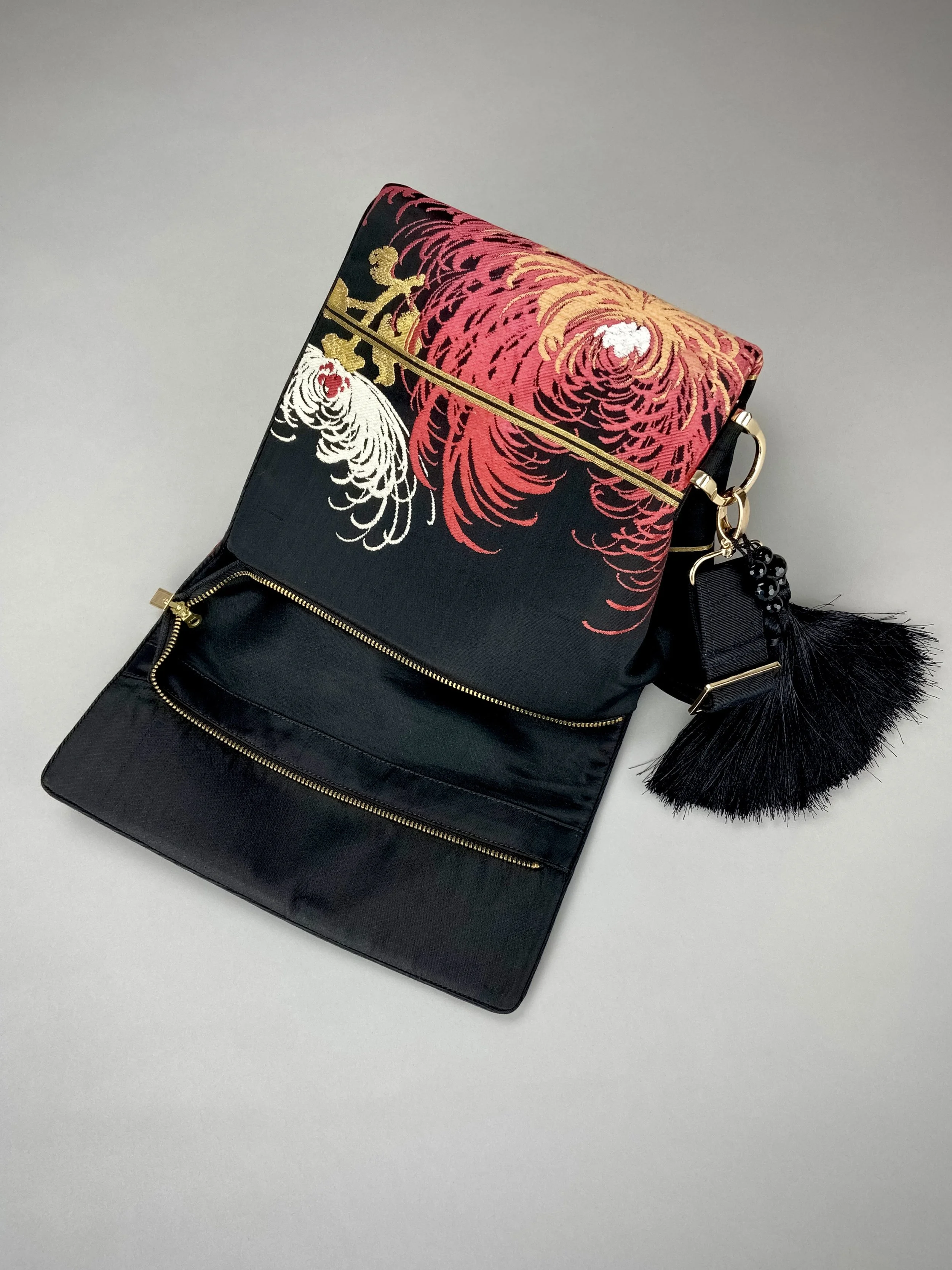 Black and crimson Chrysanthemum vintage obi silk shoulder bag with gold thread detail and black silk tassel charm by Kirsty Chivers