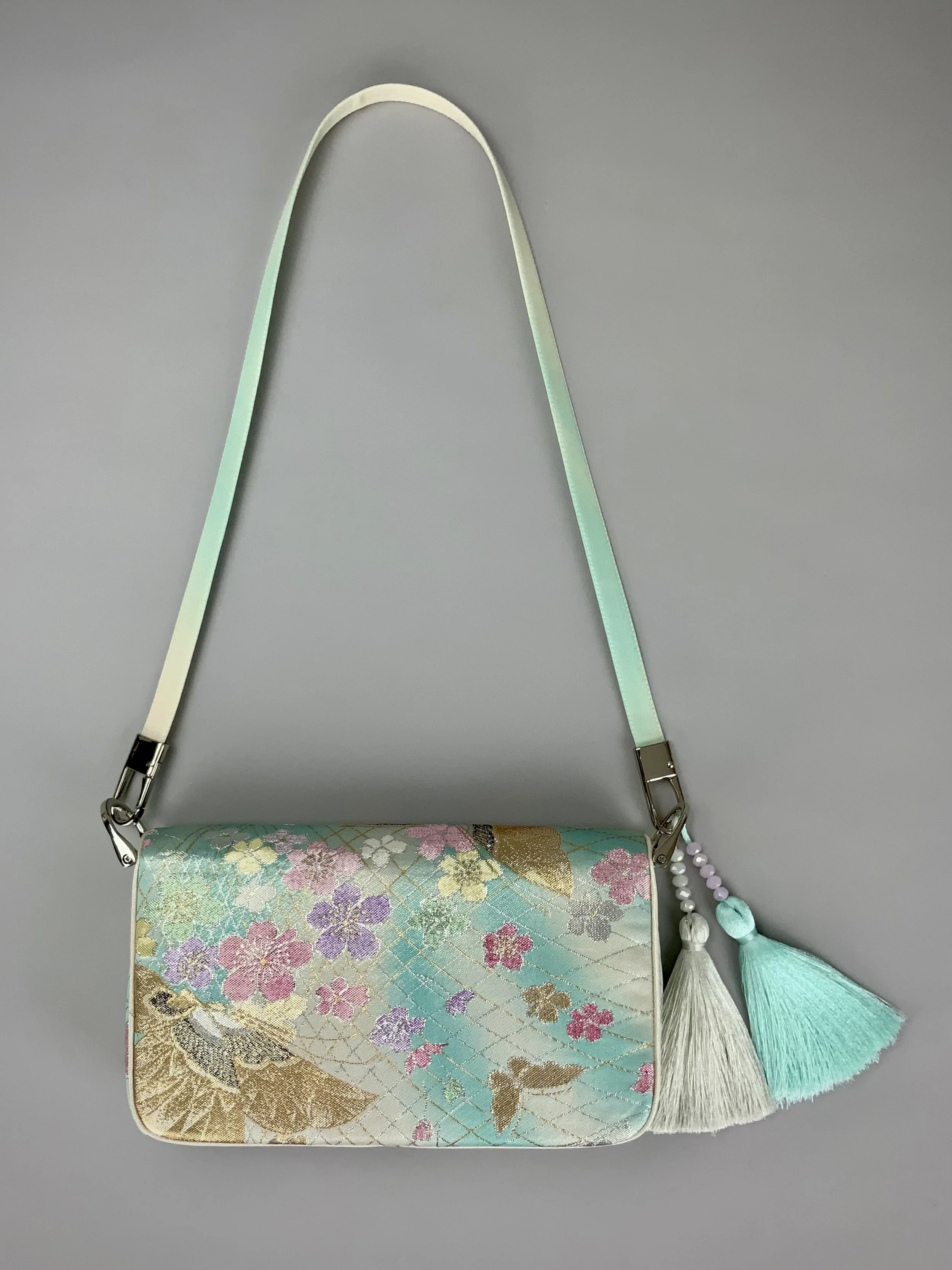 Aqua ombre evening bag made from vintage obi silk with pastel gold butterfly and blossom design by Kirsty Chivers