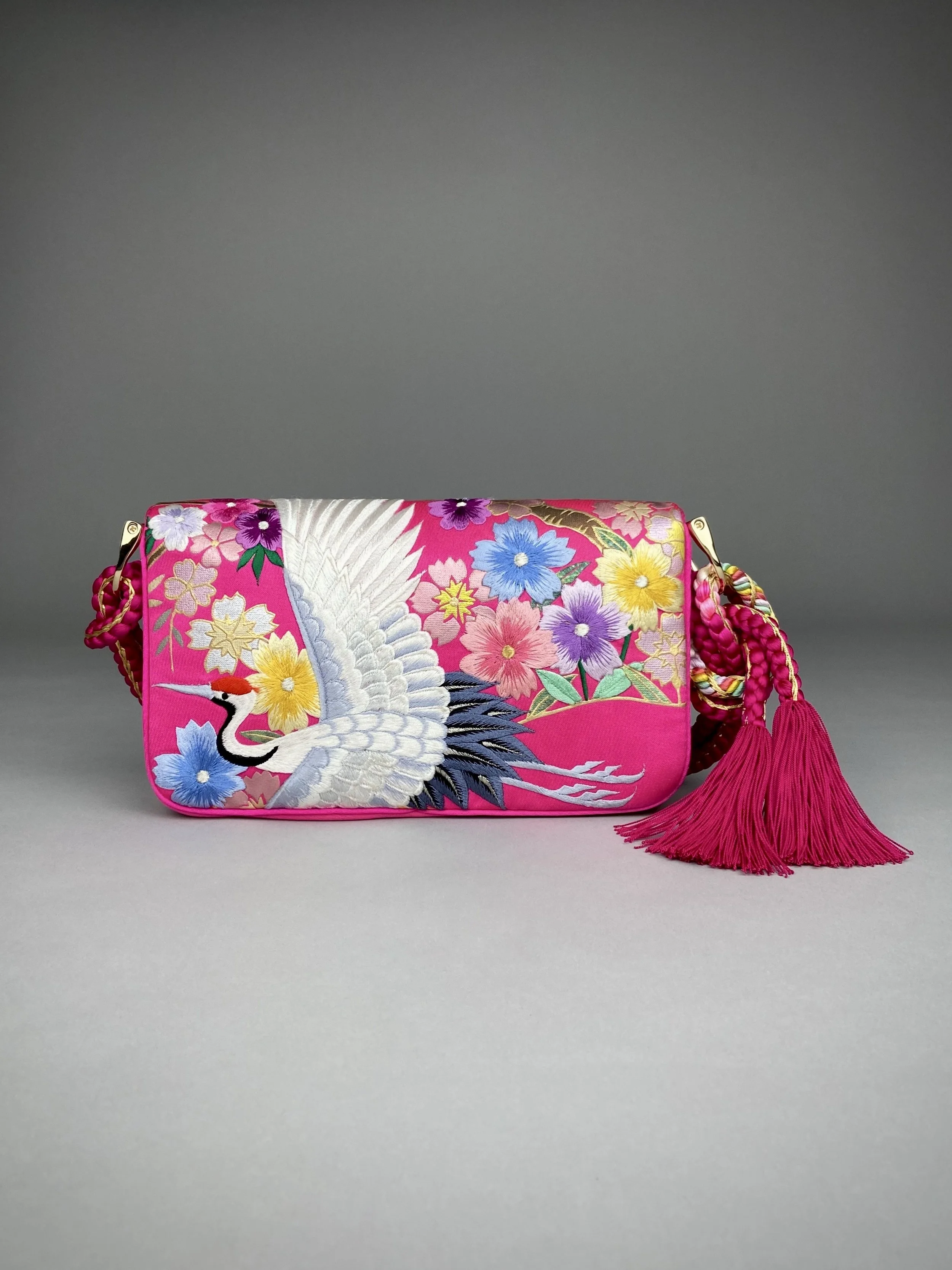 Cherry Pink Blossom & Crane baguette bag, handmade from vintage Japanese kimono silk with tasseled obijime cord strap by Kirsty Chivers