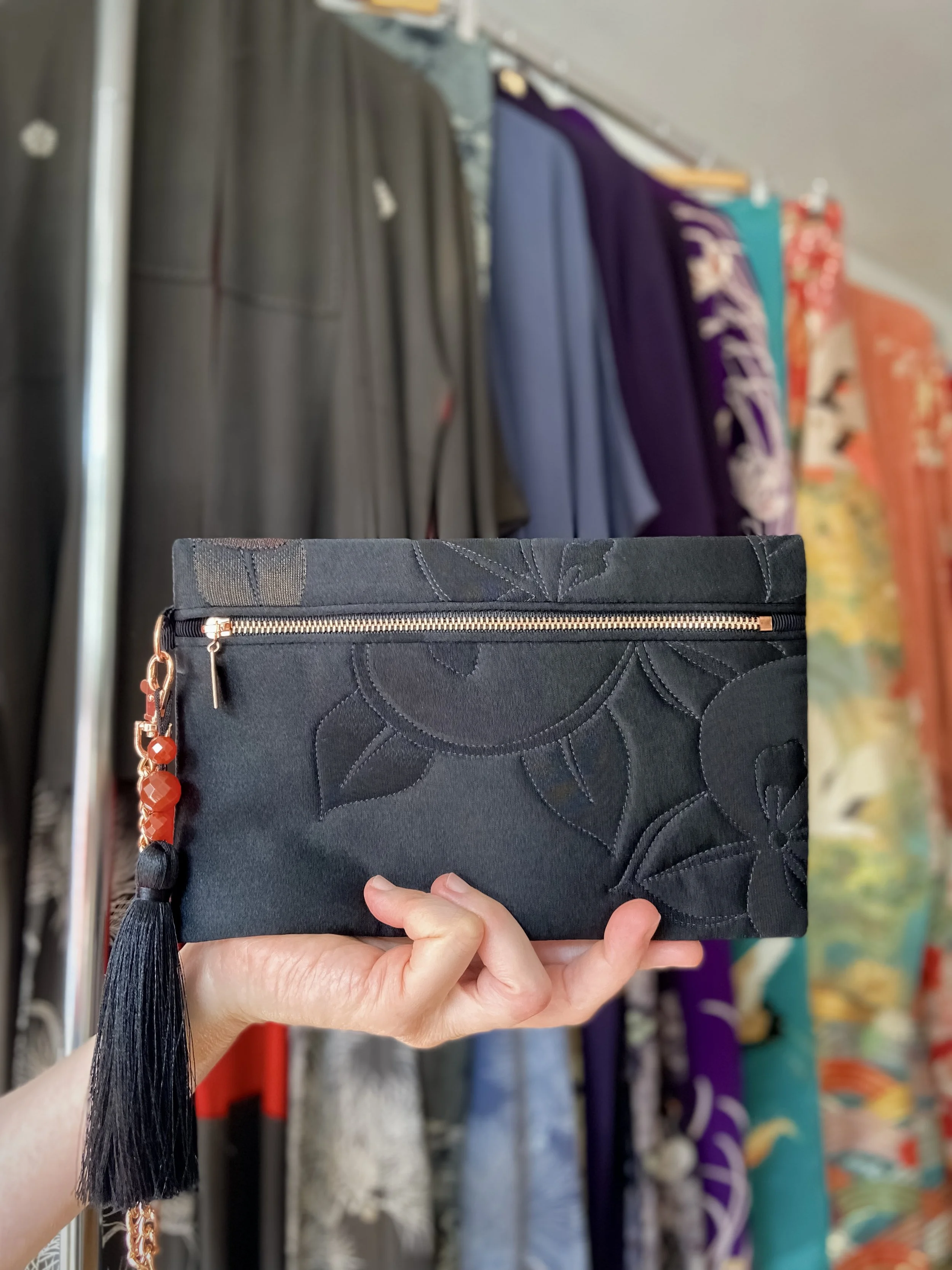 Quilted black clutch purse with tassel & Carnelian beads, made from vintage Japanese kimono silk