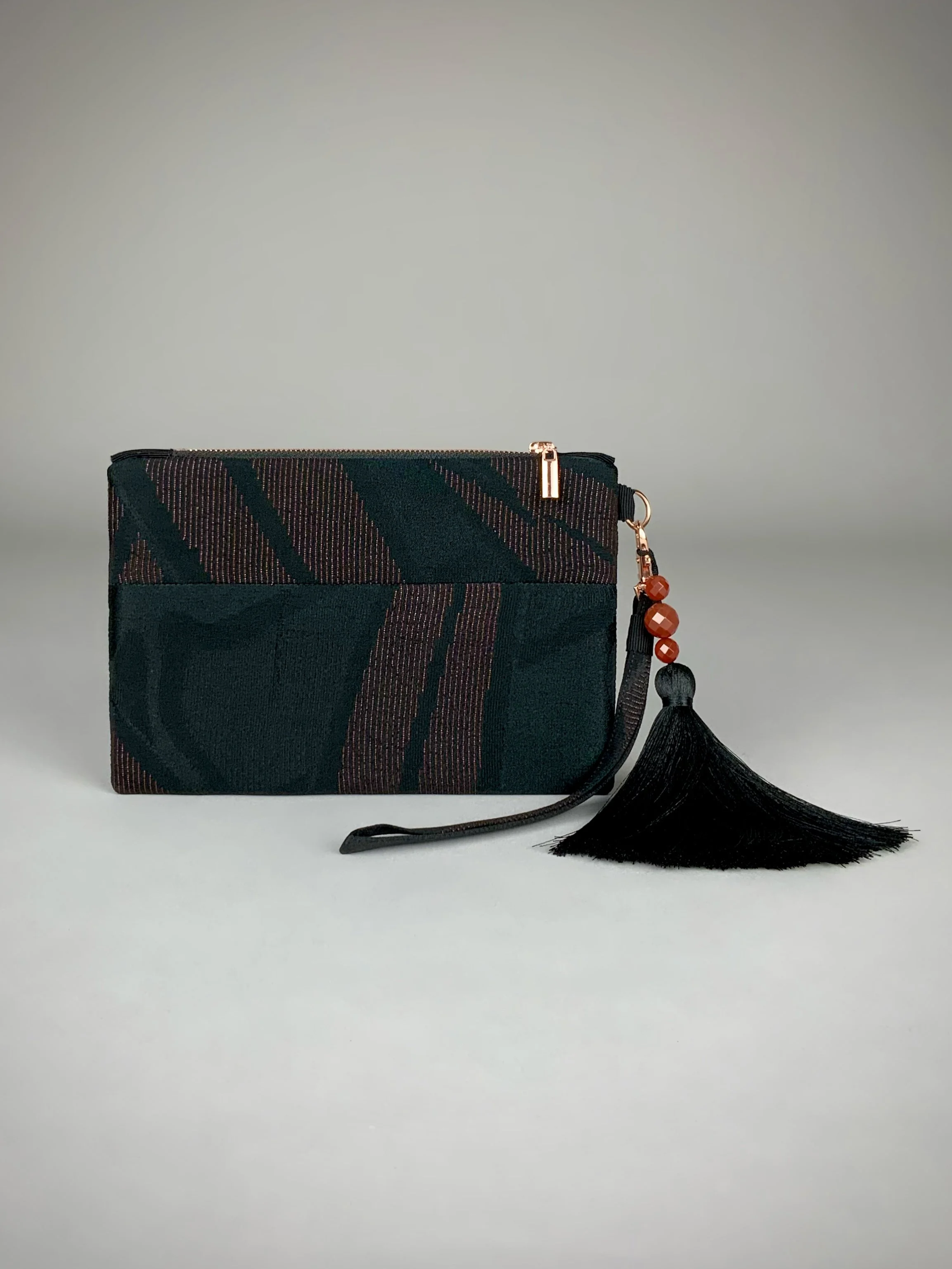Black silk wristlet purse with urushi bamboo leaf design & silk tassel, made from vintage Japanese kimono fabric by Kirsty Chivers