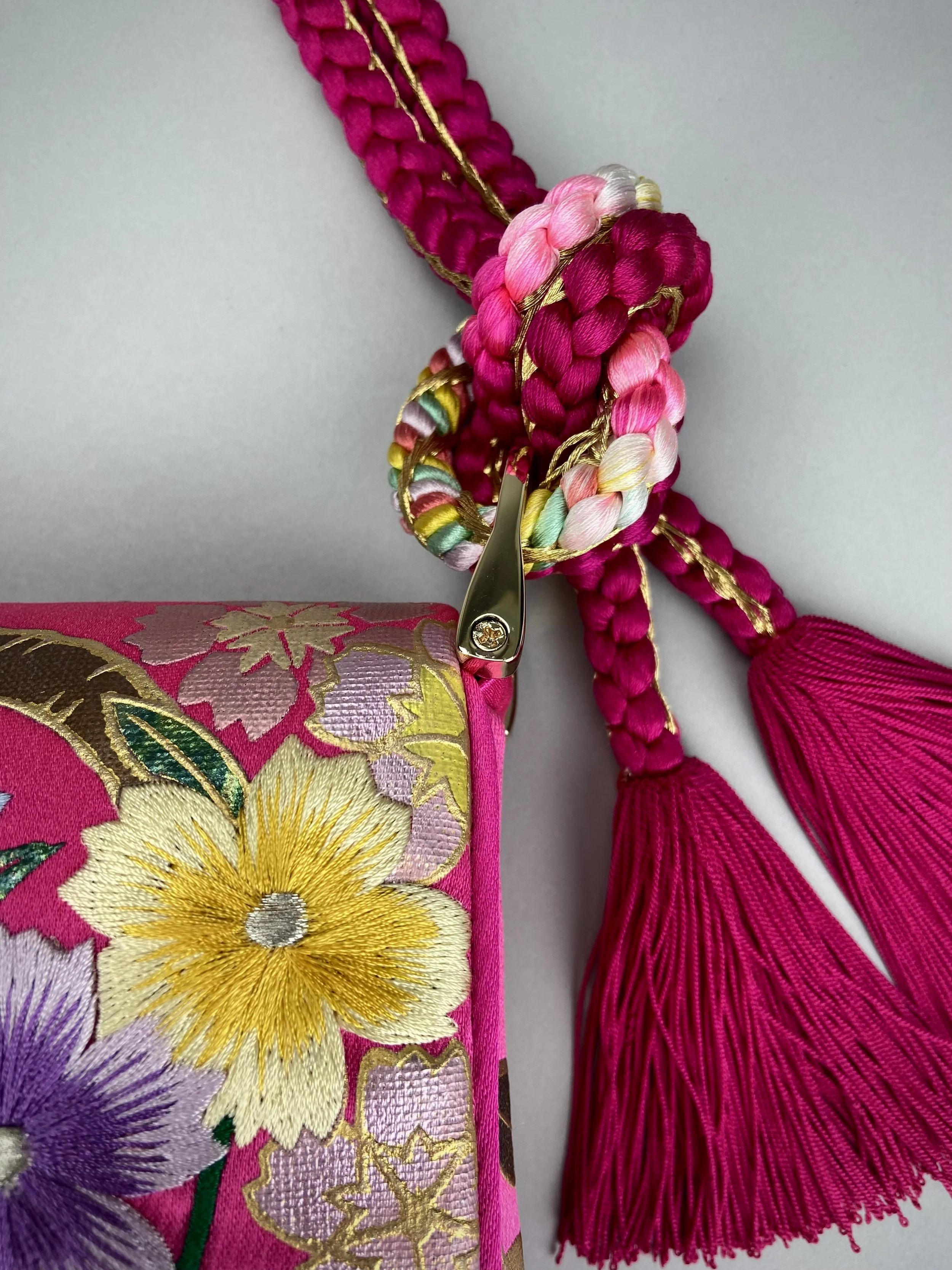 Cherry Pink Blossom & Crane baguette bag, handmade from vintage Japanese kimono silk with tasseled obijime cord strap by Kirsty Chivers