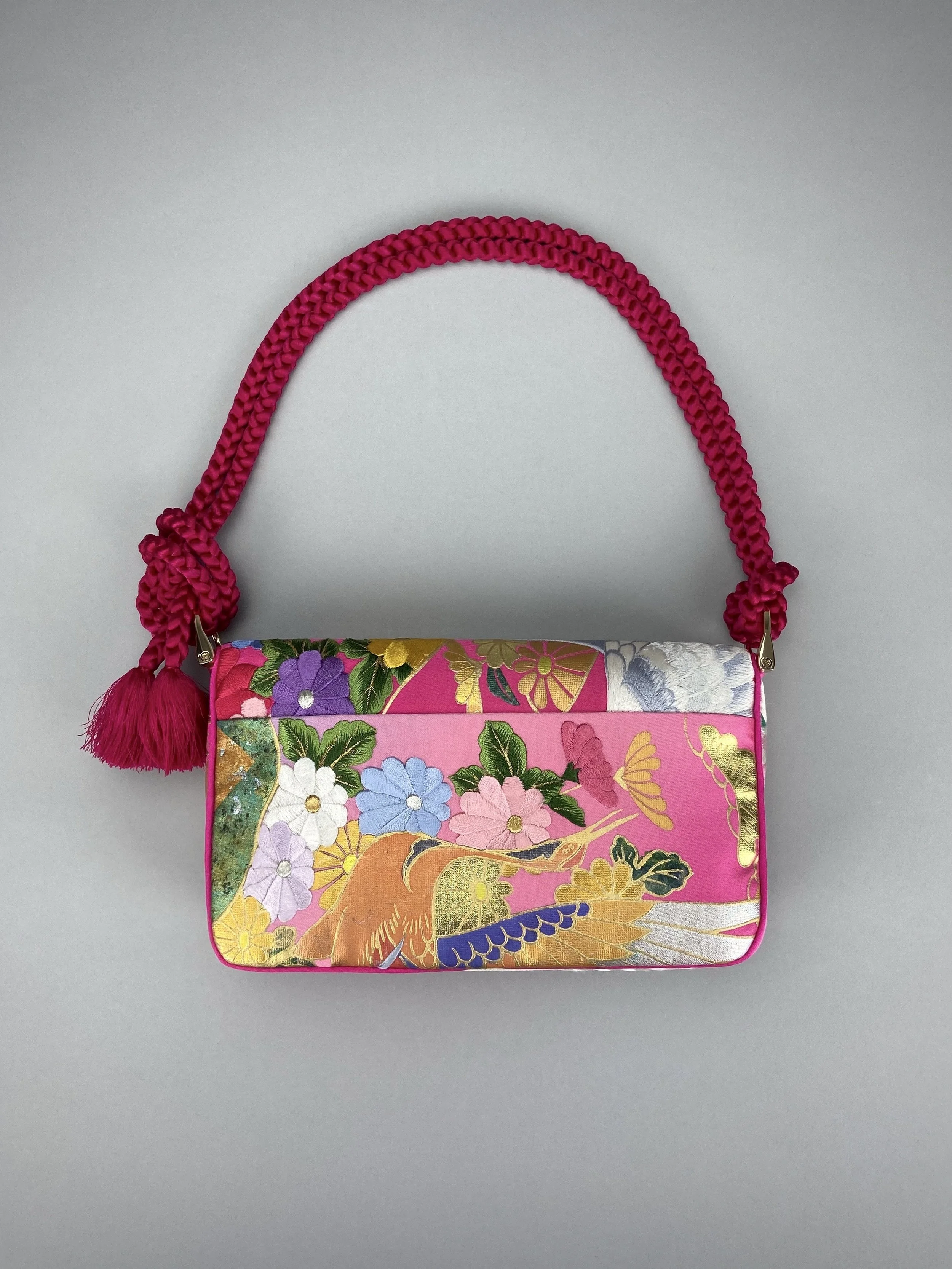 Cherry Pink Crane Feather baguette bag, handmade from vintage Japanese kimono silk with tasseled obijime cord strap by Kirsty Chivers