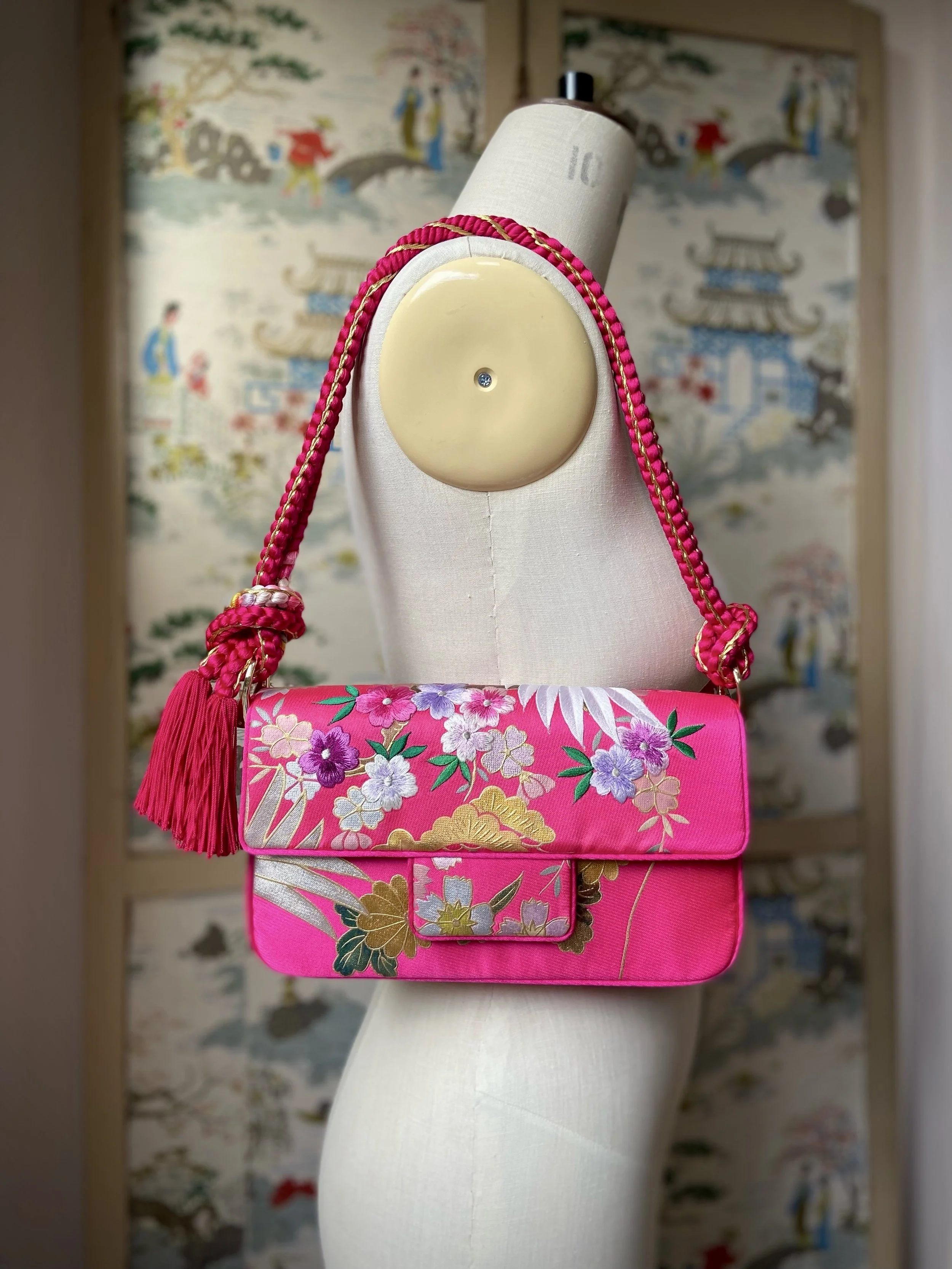 Cherry Pink Blossom & Crane baguette bag, handmade from vintage Japanese kimono silk with tasseled obijime cord strap by Kirsty Chivers