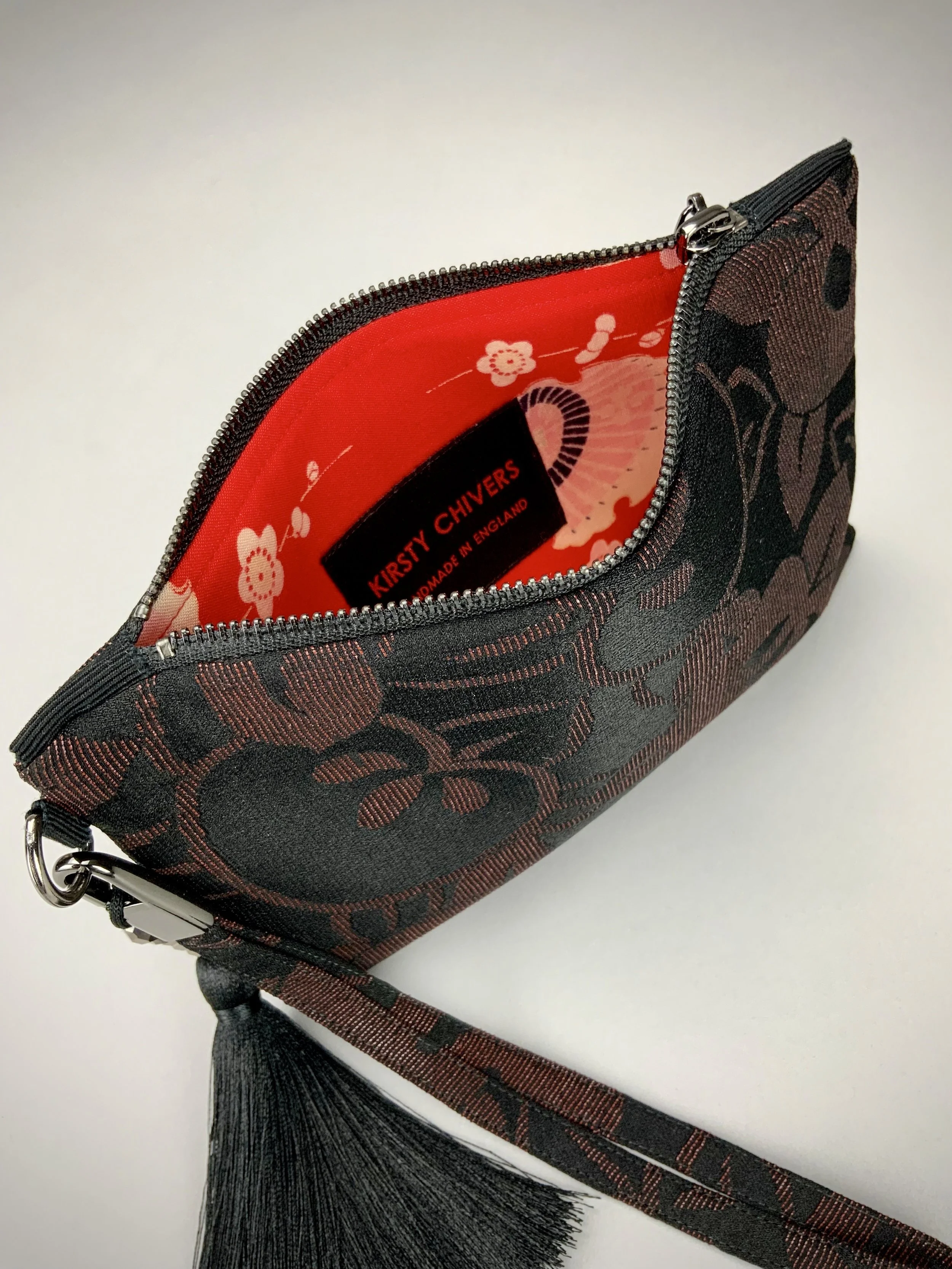 Black silk wristlet purse with glittery Persimmon fruit design & silk tassel, made from vintage Japanese kimono fabric by Kirsty Chivers