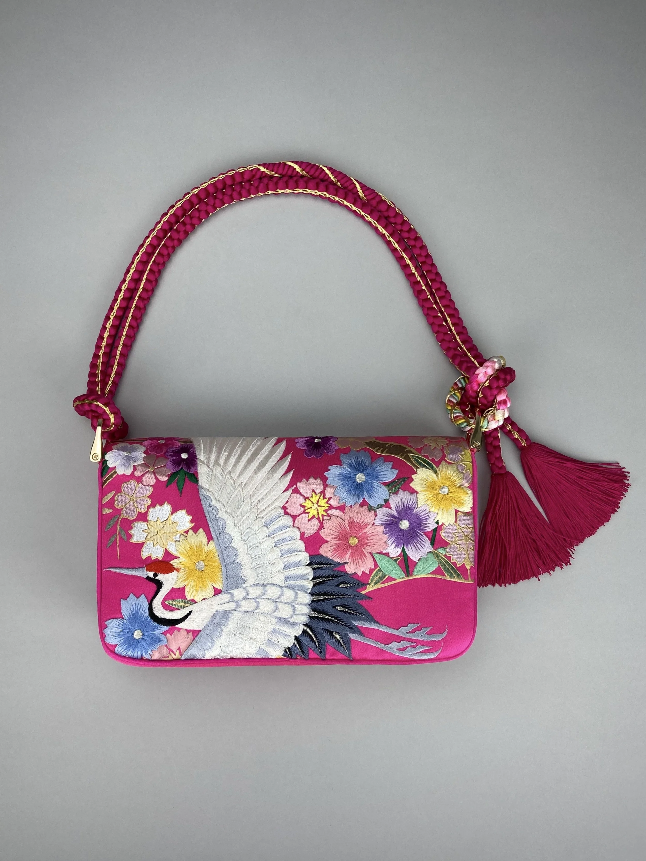Cherry Pink Blossom & Crane baguette bag, handmade from vintage Japanese kimono silk with tasseled obijime cord strap by Kirsty Chivers