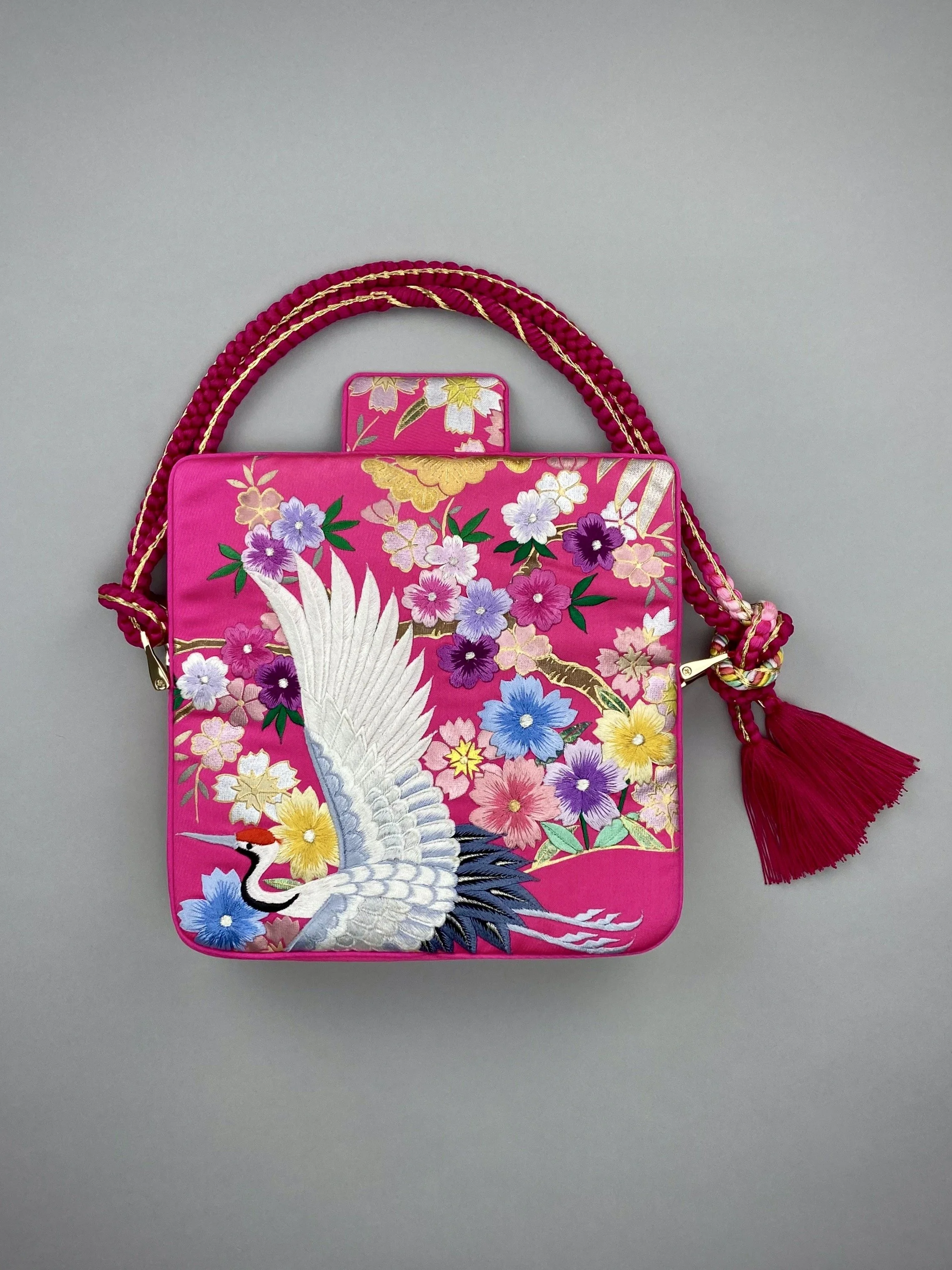 Cherry Pink Blossom & Crane baguette bag, handmade from vintage Japanese kimono silk with tasseled obijime cord strap by Kirsty Chivers