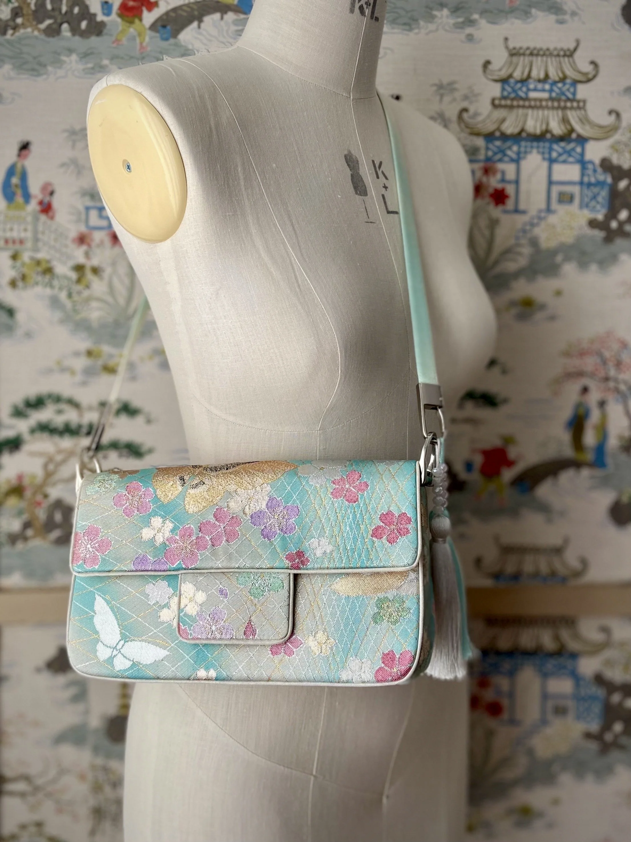 Aqua ombre evening bag made from vintage obi silk with pastel gold butterfly and blossom design by Kirsty Chivers