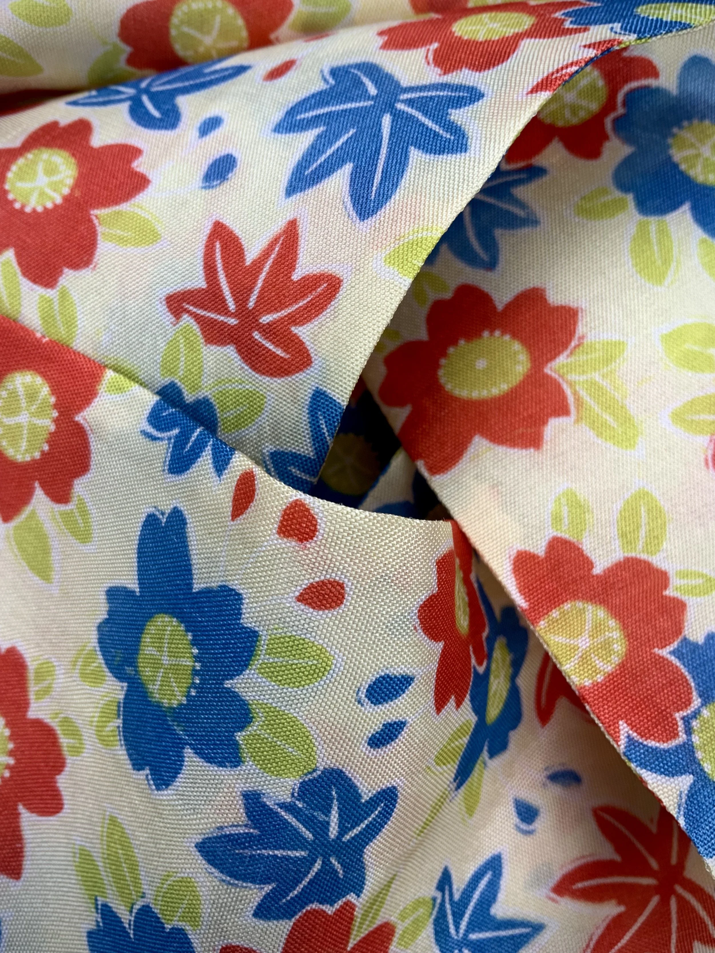 Closeup of butter yellow skinny scarf with Cherry blossom & Maple leaf print, handmade by Kirsty Chivers
