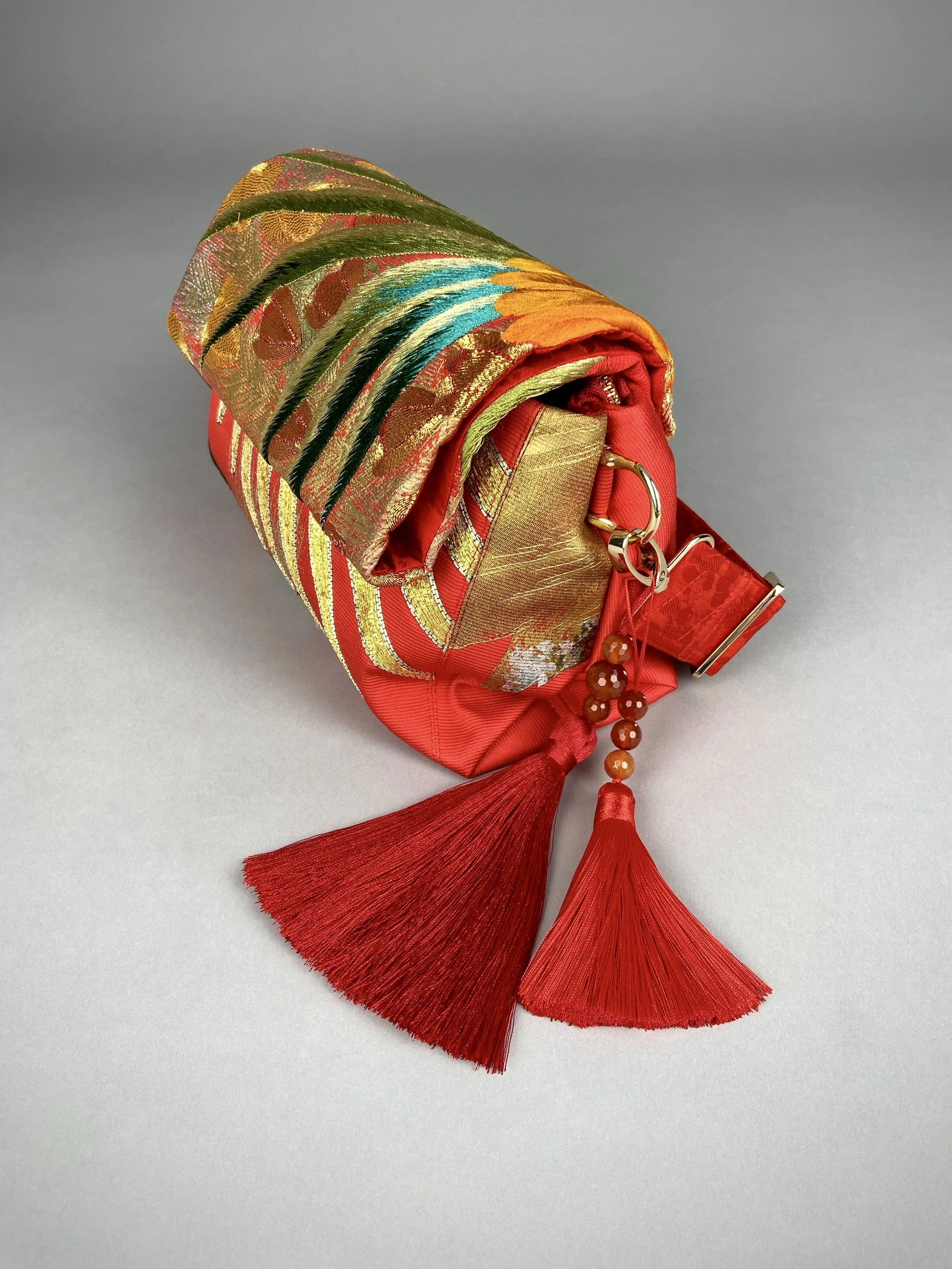 Vermillion red vintage kimono silk evening bag with gold Peacock feather design, Agate beaded tassel charm by Kirsty Chivers