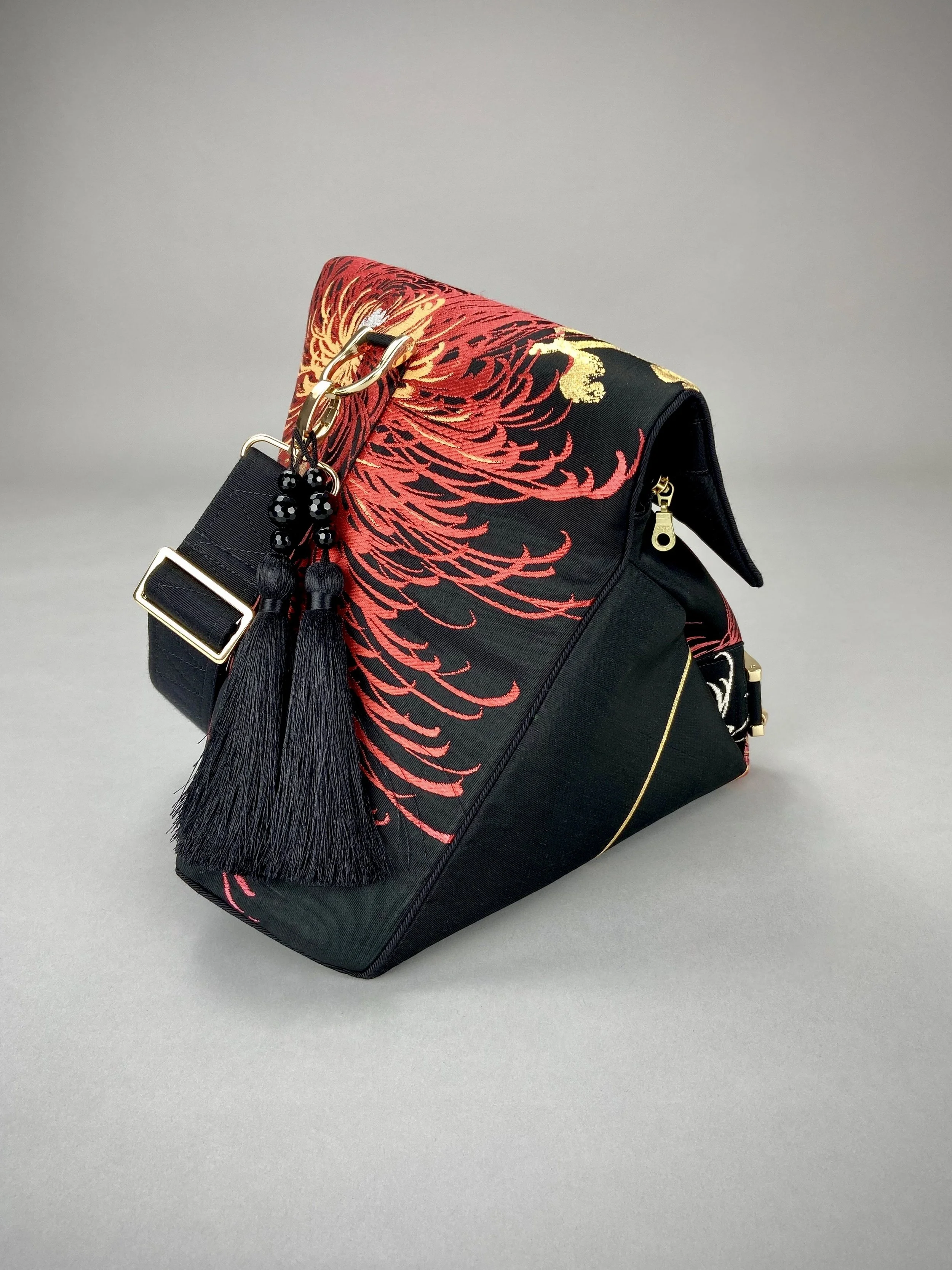 Black and crimson Chrysanthemum vintage obi silk shoulder bag with gold thread detail and black silk tassel charm by Kirsty Chivers