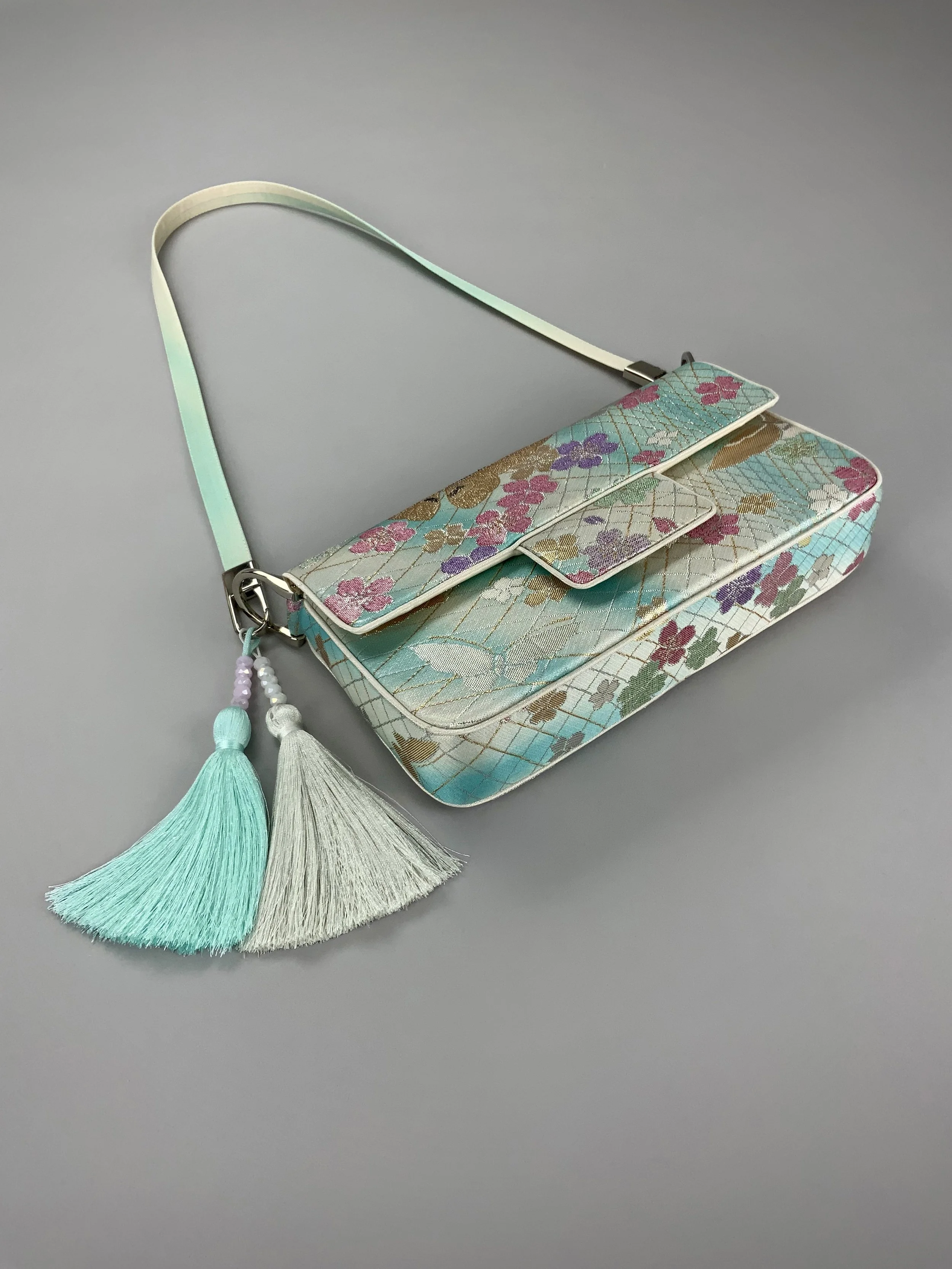 Aqua ombre evening bag made from vintage obi silk with pastel gold butterfly and blossom design by Kirsty Chivers