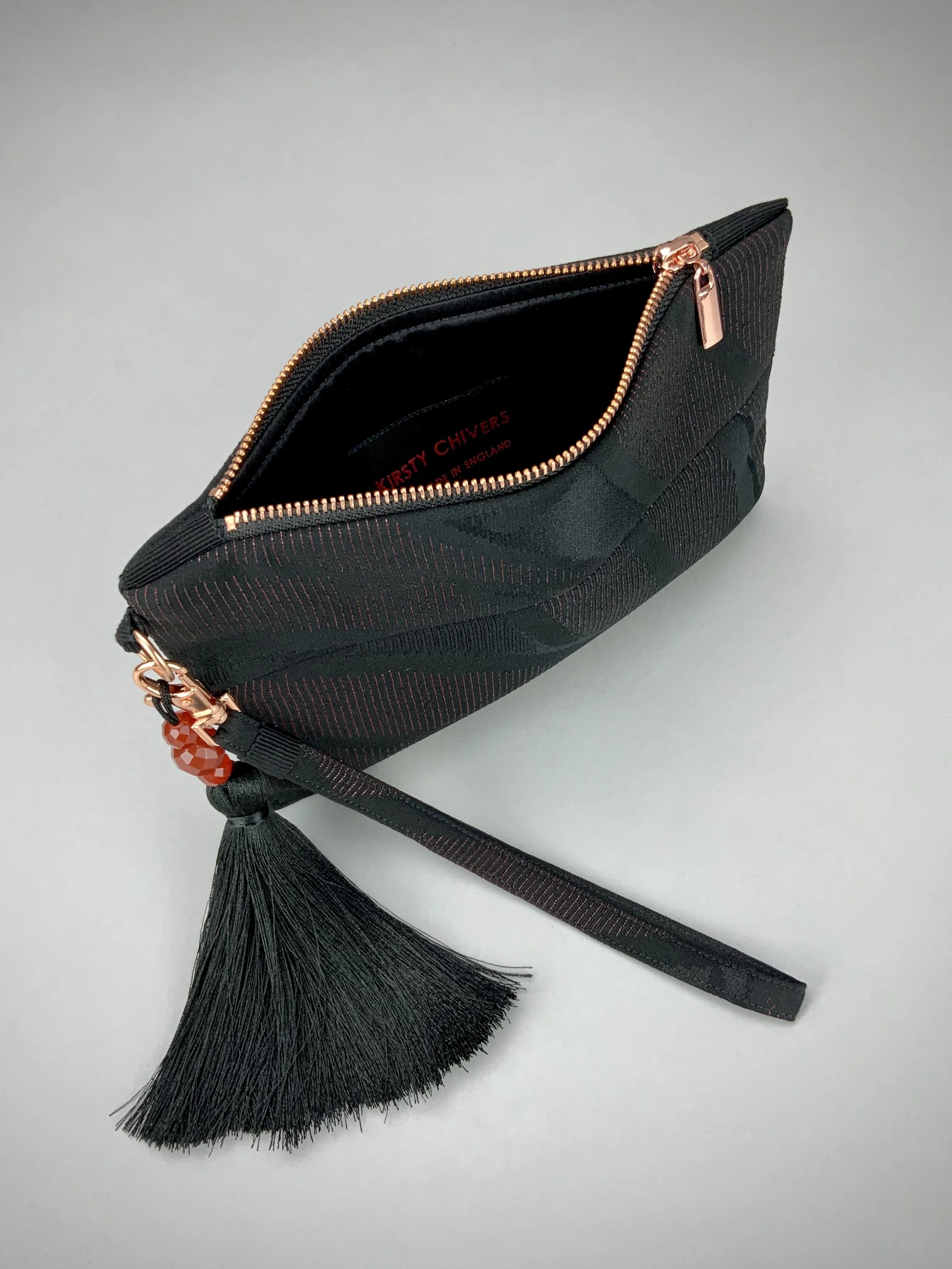 Black silk wristlet purse with urushi bamboo leaf design & silk tassel, made from vintage Japanese kimono fabric by Kirsty Chivers