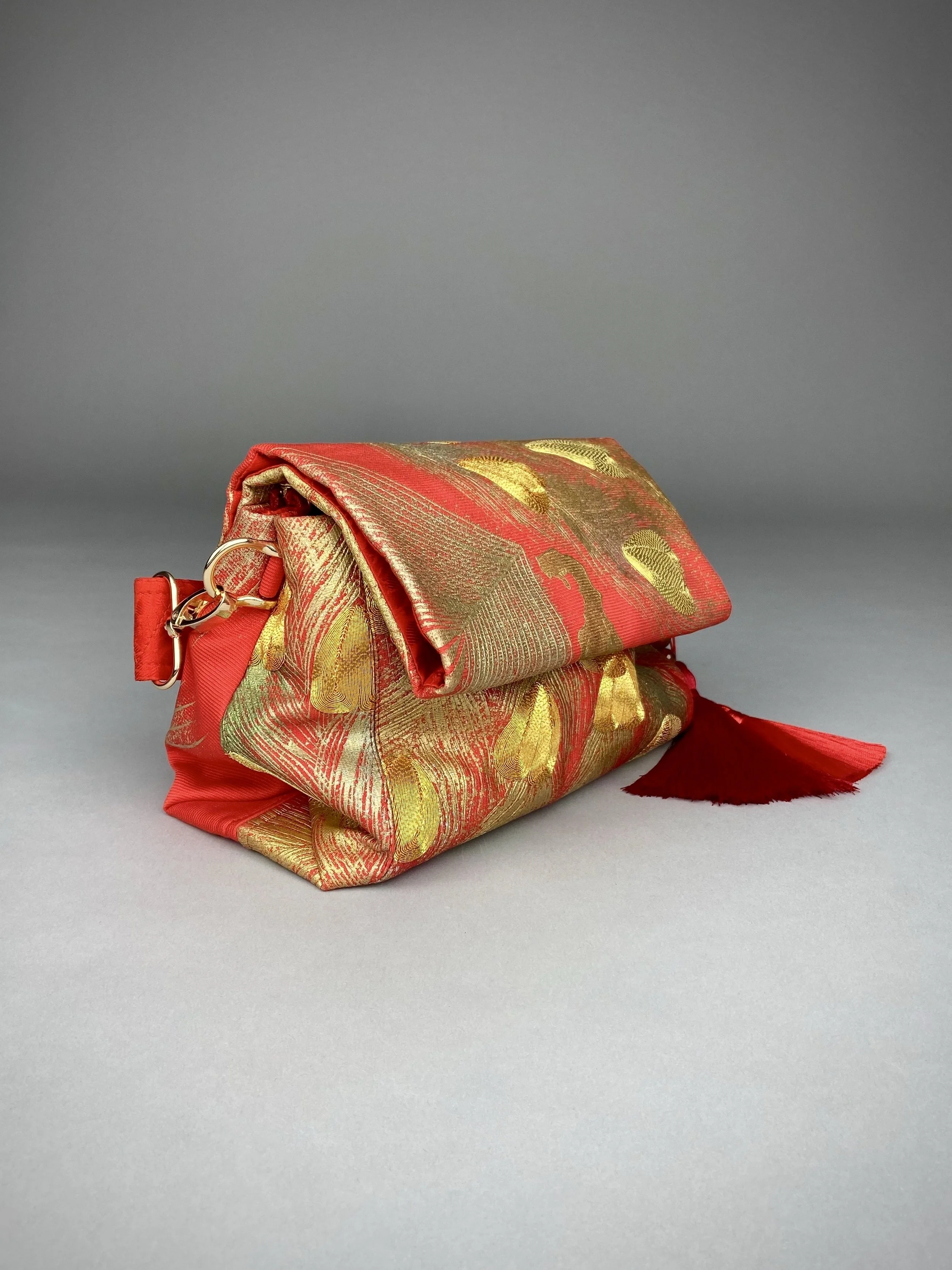 Vermillion red vintage kimono silk evening bag with gold Peacock feather design by Kirsty Chivers