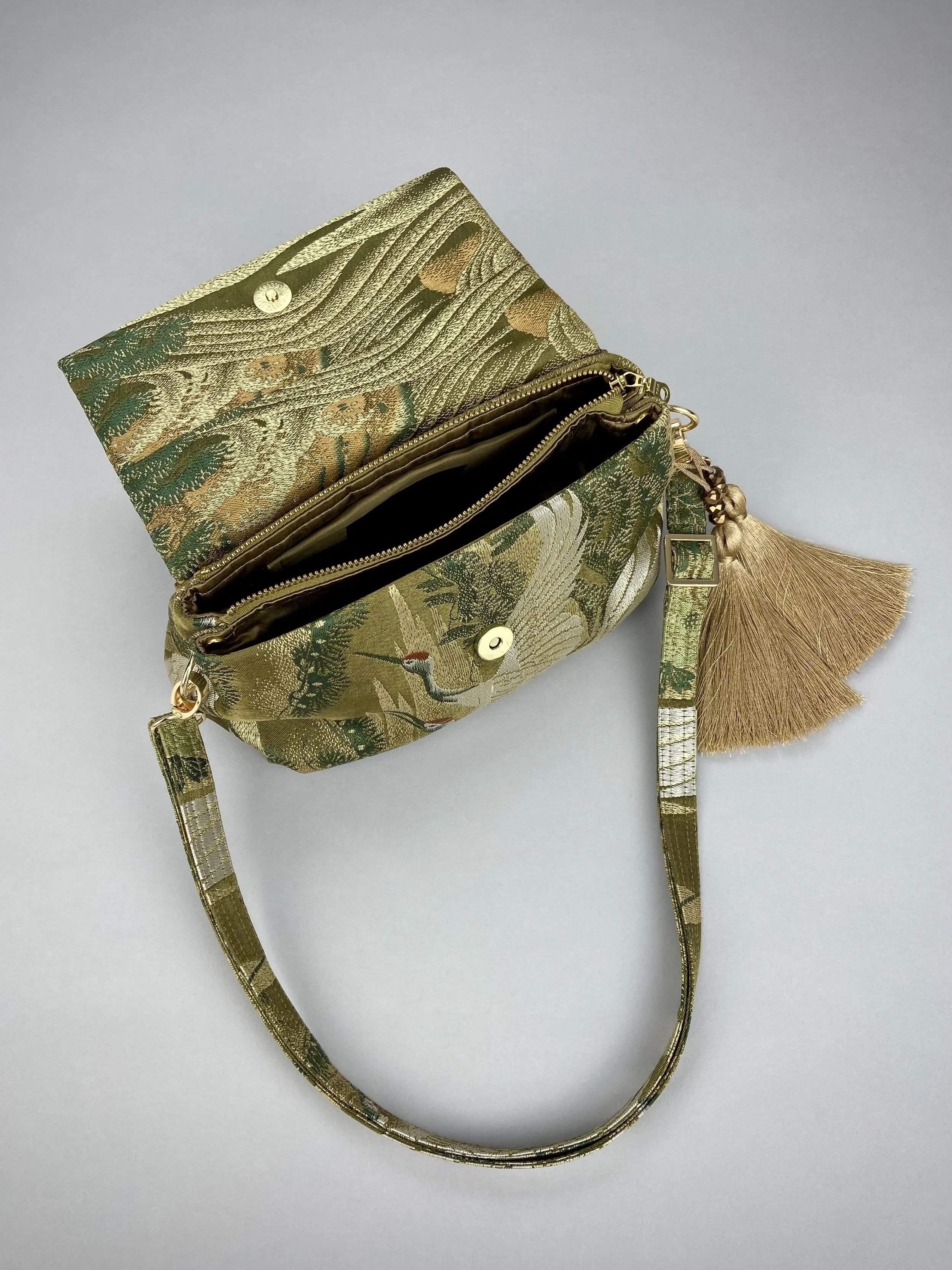 Green Flying Crane evening bag, made from repurposed vintage Japanese obi silk by Kirsty Chivers