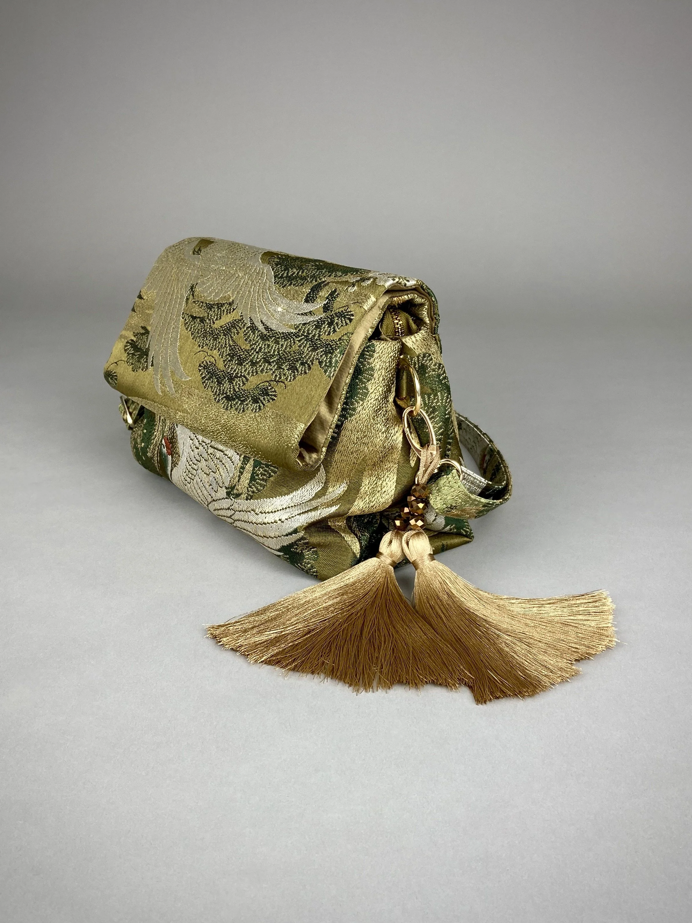 Green Flying Crane evening bag, made from repurposed vintage Japanese obi silk by Kirsty Chivers