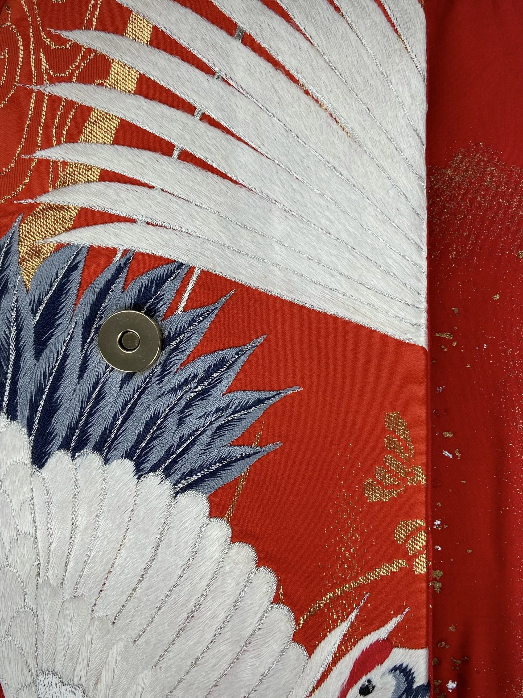 Vermillion Crane Feather baguette bag, made from vintage Japanese kimono silk, with gold hardware and Agate beaded tassel charms by Kirsty Chivers