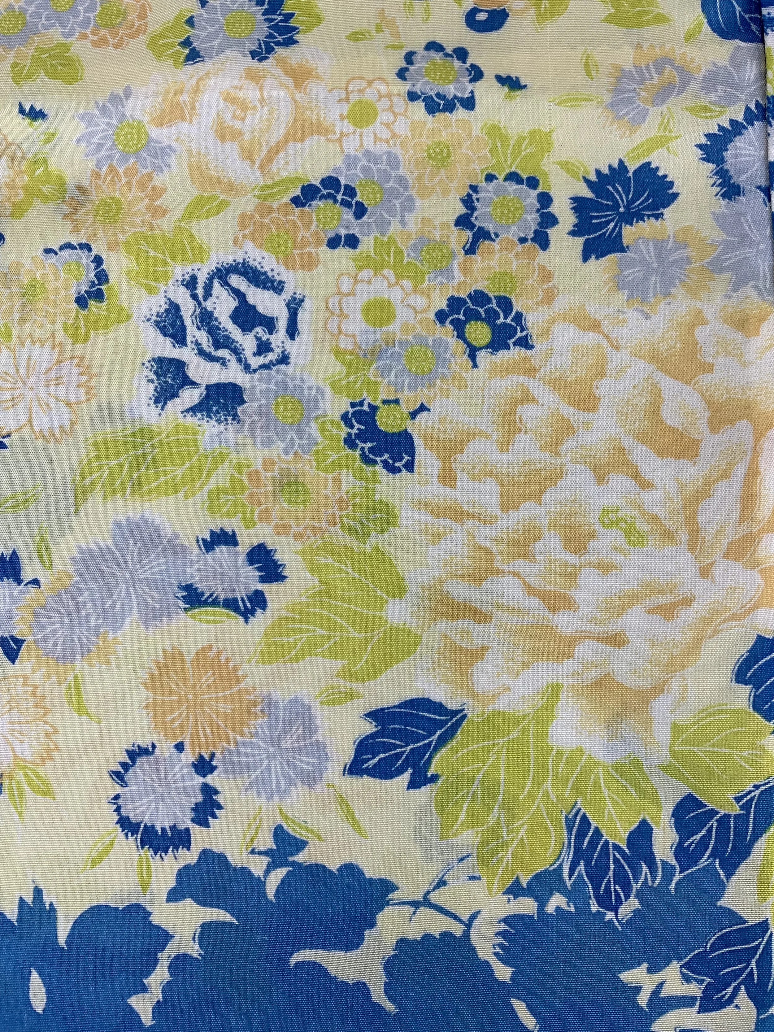 Closeup of yellow scarf with blossom print handmade from kimono fabric and silk satin by Kirsty Chivers