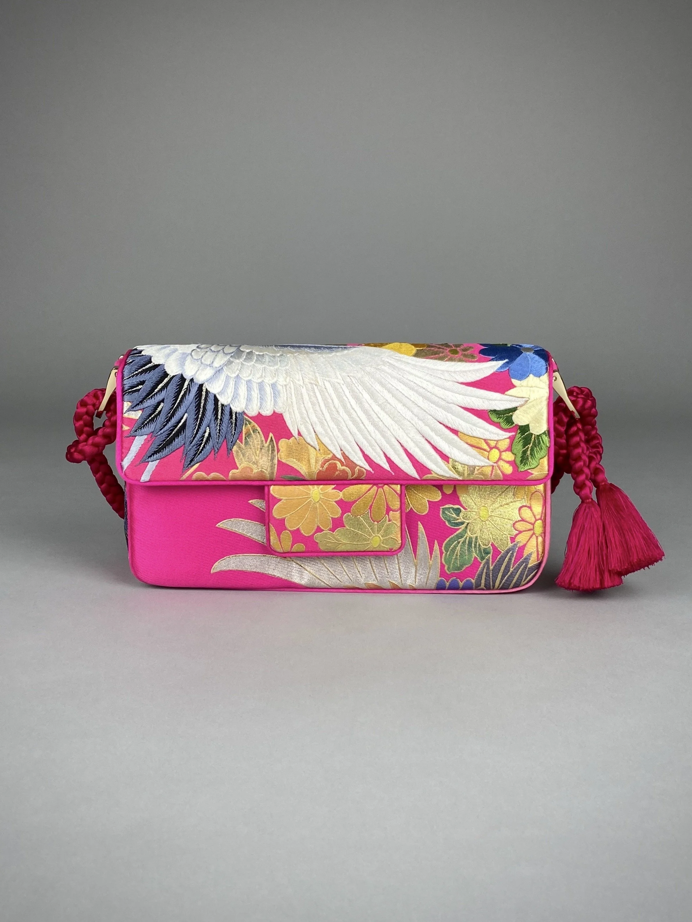 Cherry Pink Crane Feather baguette bag, handmade from vintage Japanese kimono silk with tasseled obijime cord strap by Kirsty Chivers