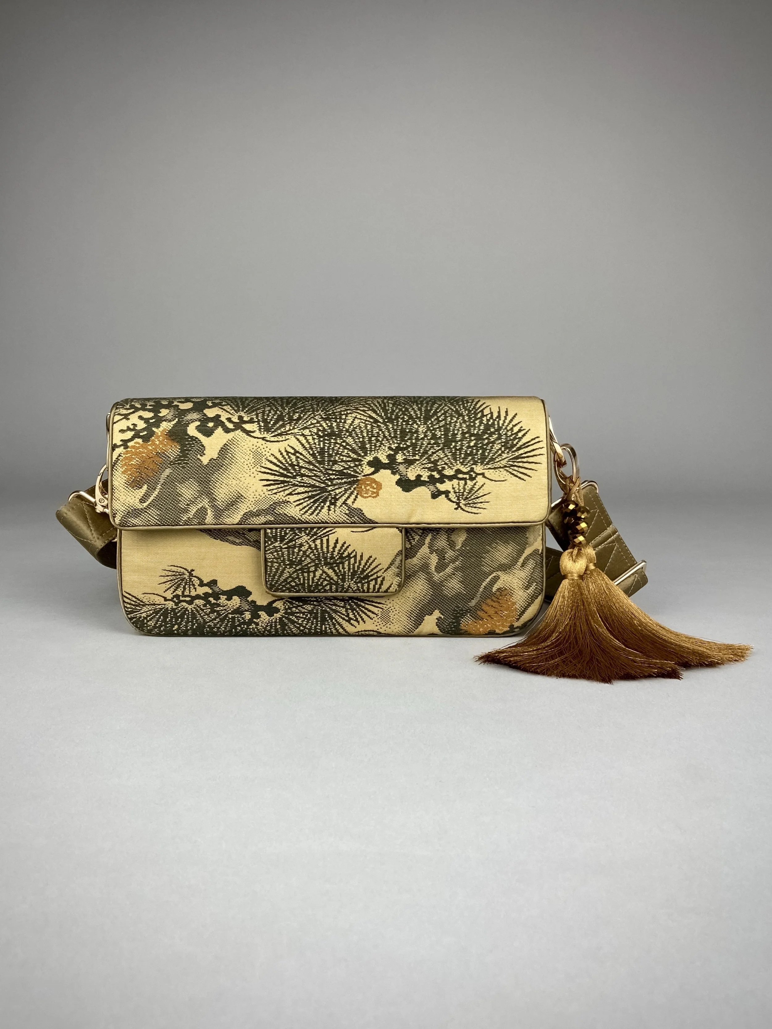 Unique Matsu pine baguette bag, made from vintage Japanese obi silk, with crane design, gold hardware and matching tassel charms by Kirsty Chivers