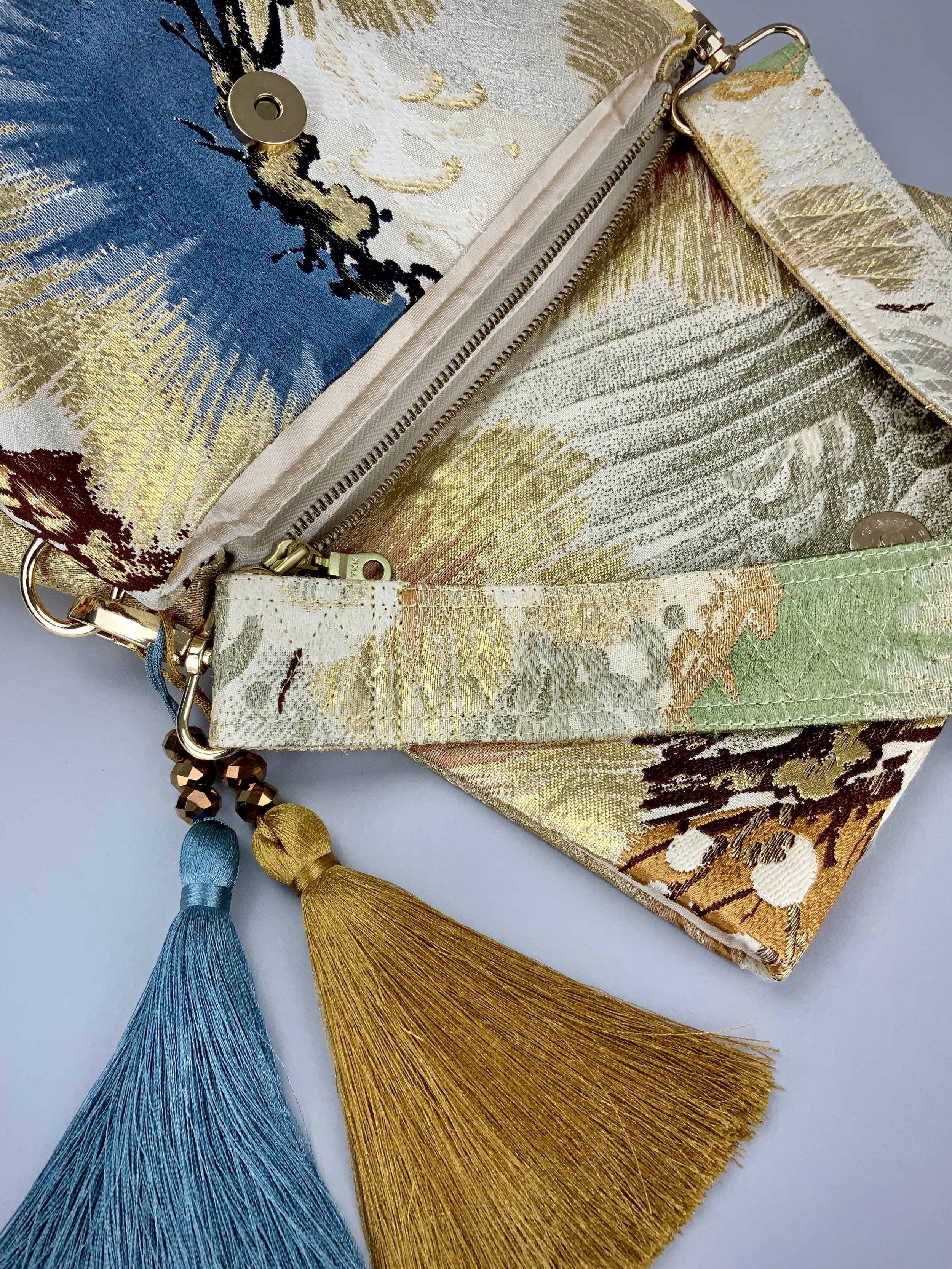 Metallic gold evening bag with Matsu pine and blossom design, made from vintage obi silk by Kirsty Chivers