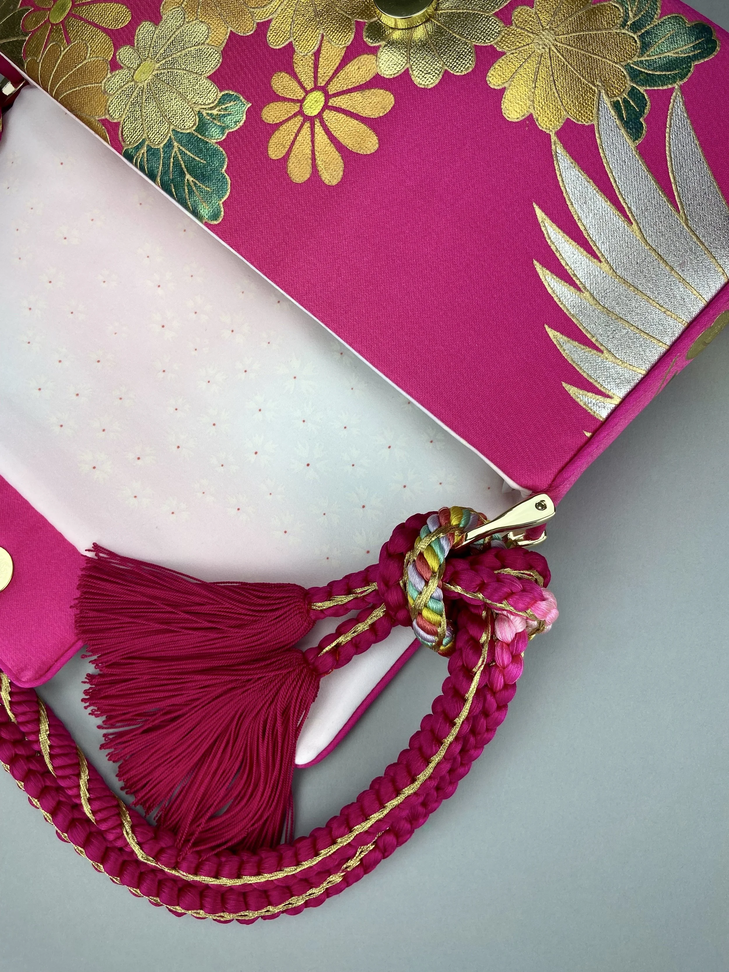Cherry Pink Blossom & Crane baguette bag, handmade from vintage Japanese kimono silk with tasseled obijime cord strap by Kirsty Chivers