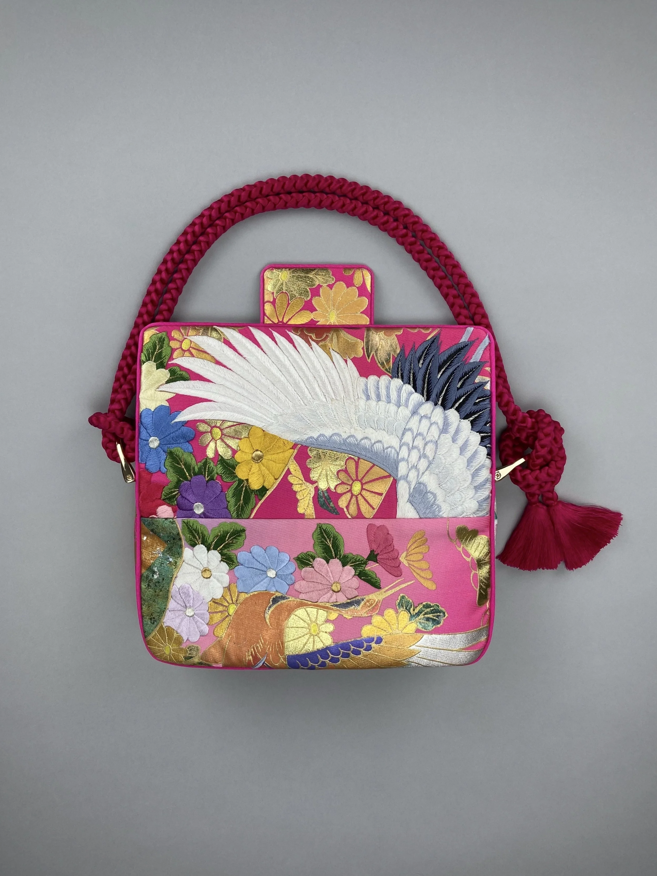 Cherry Pink Crane Feather baguette bag, handmade from vintage Japanese kimono silk with tasseled obijime cord strap by Kirsty Chivers