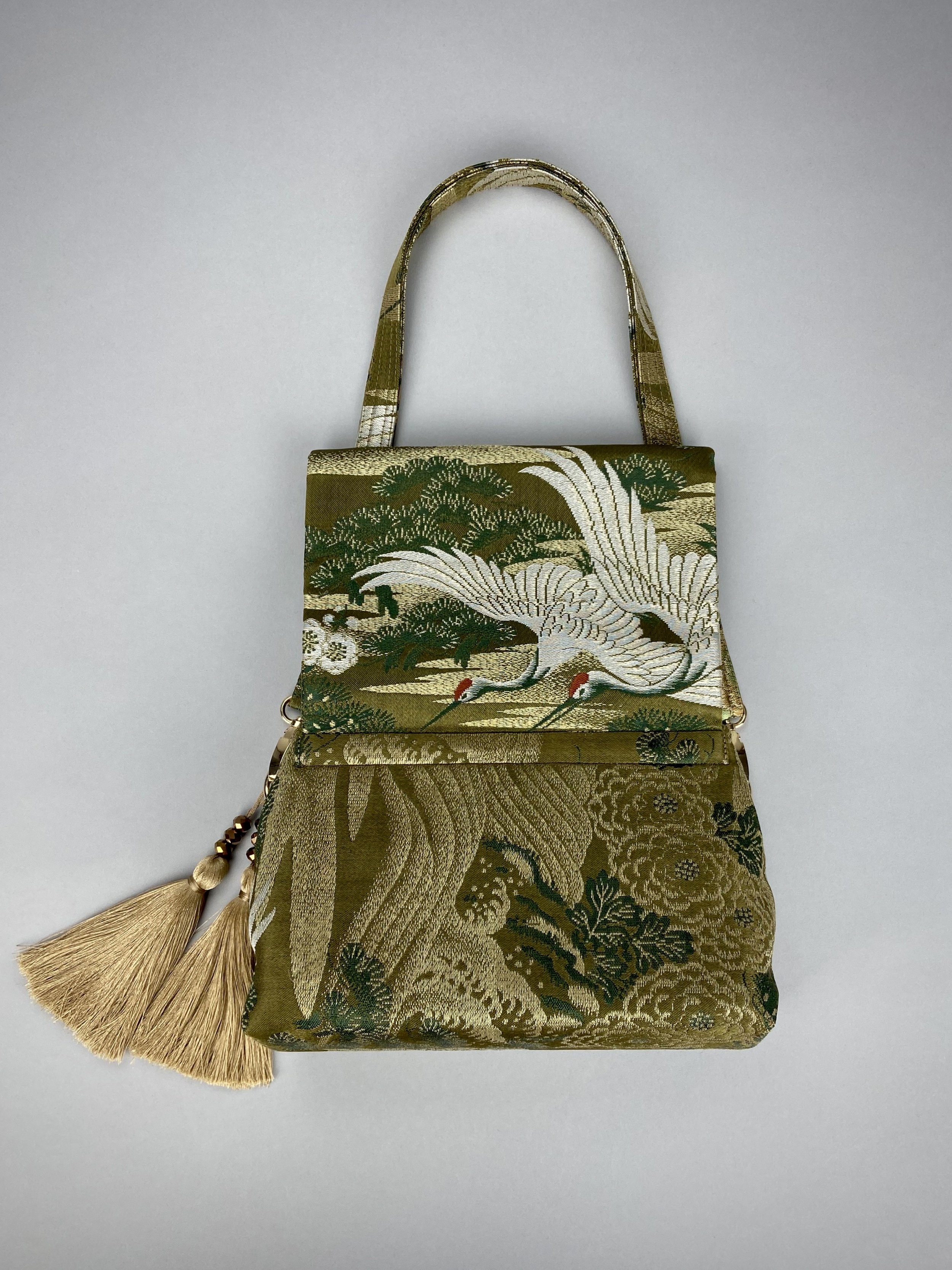 Green Flying Crane evening bag, made from repurposed vintage Japanese obi silk by Kirsty Chivers