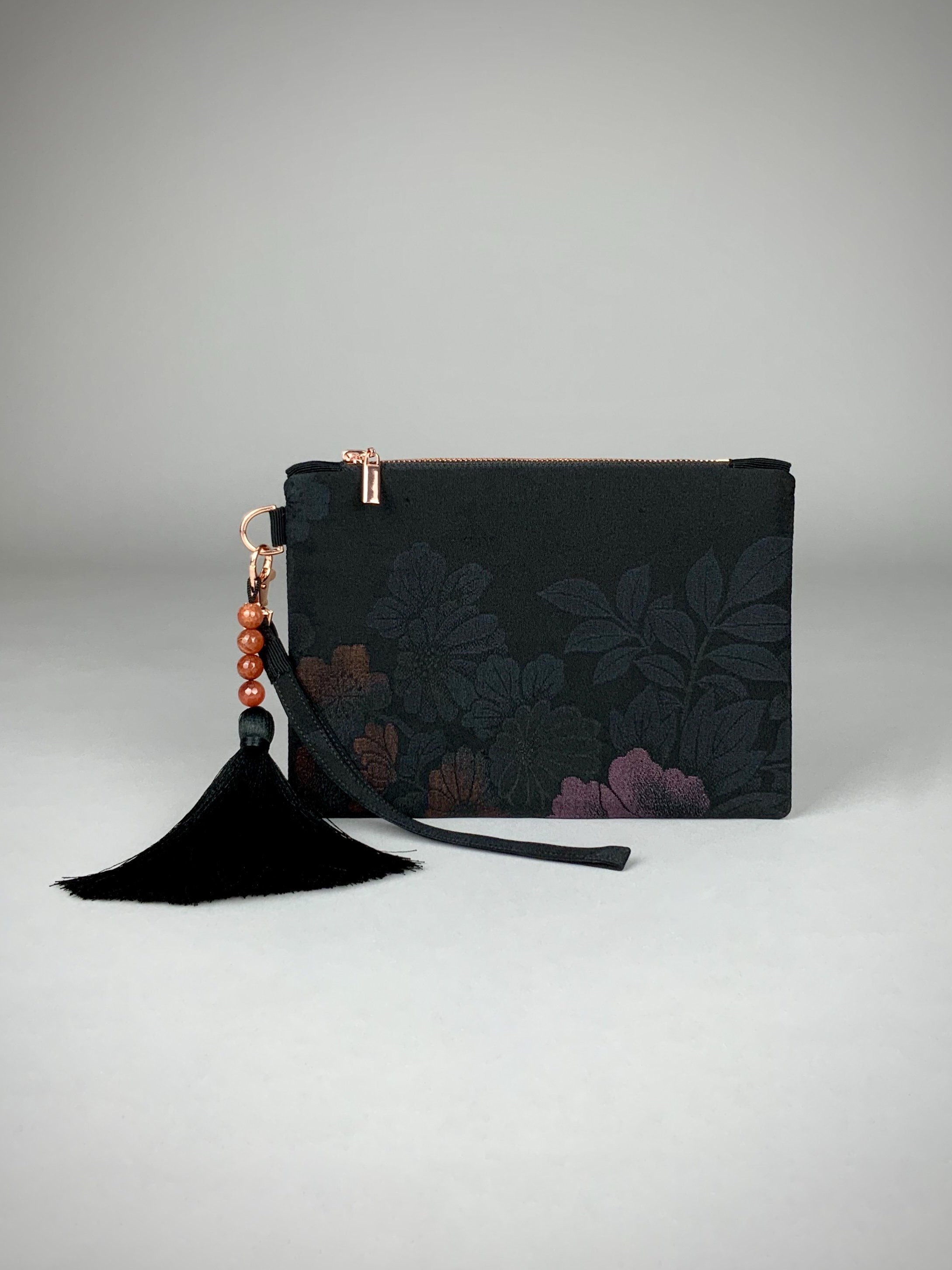 Black silk wristlet purse with blossom flower design & silk tassel, made from vintage Japanese kimono fabric by Kirsty Chivers