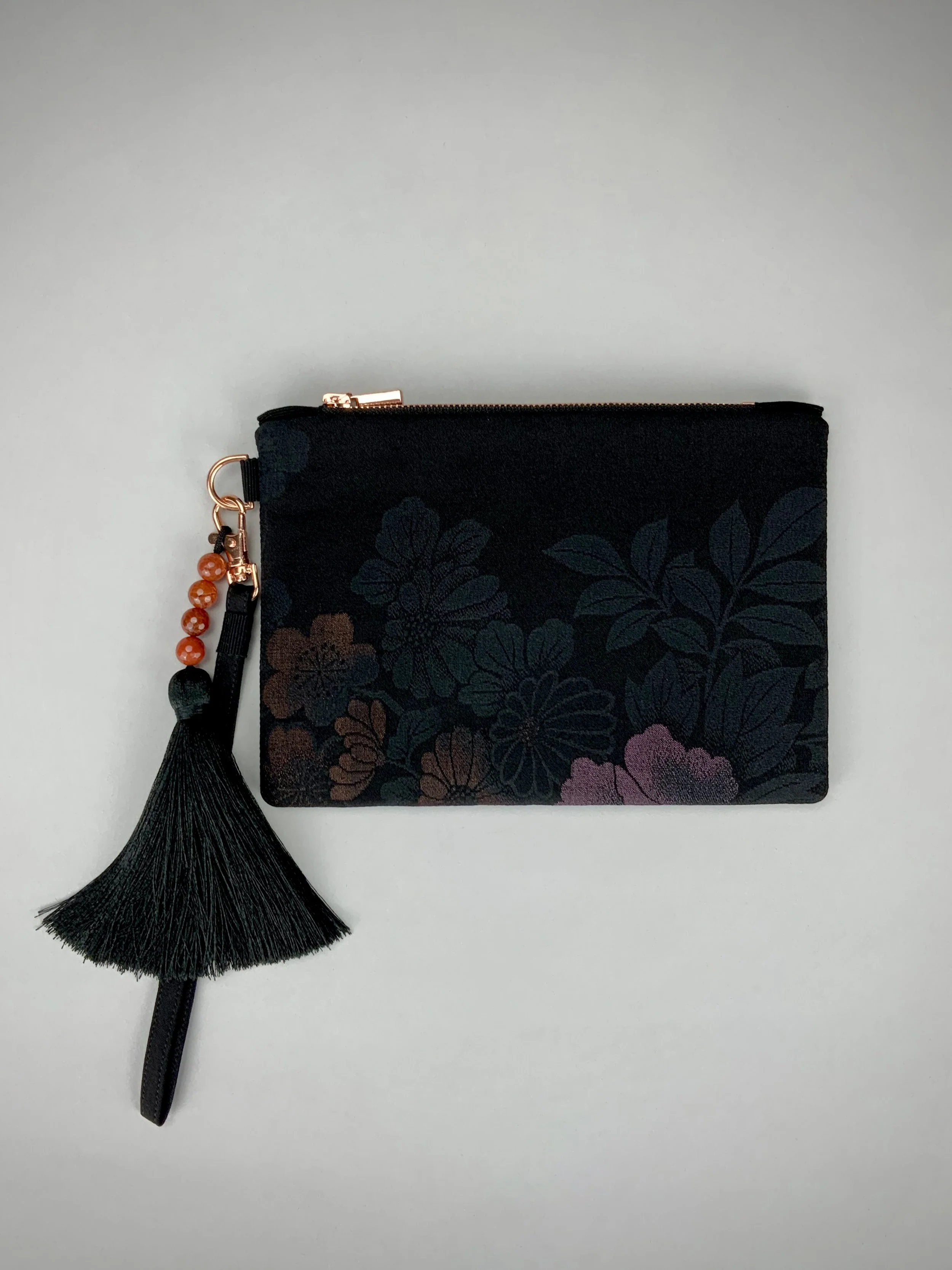 Black silk wristlet purse with blossom flower design & silk tassel, made from vintage Japanese kimono fabric by Kirsty Chivers