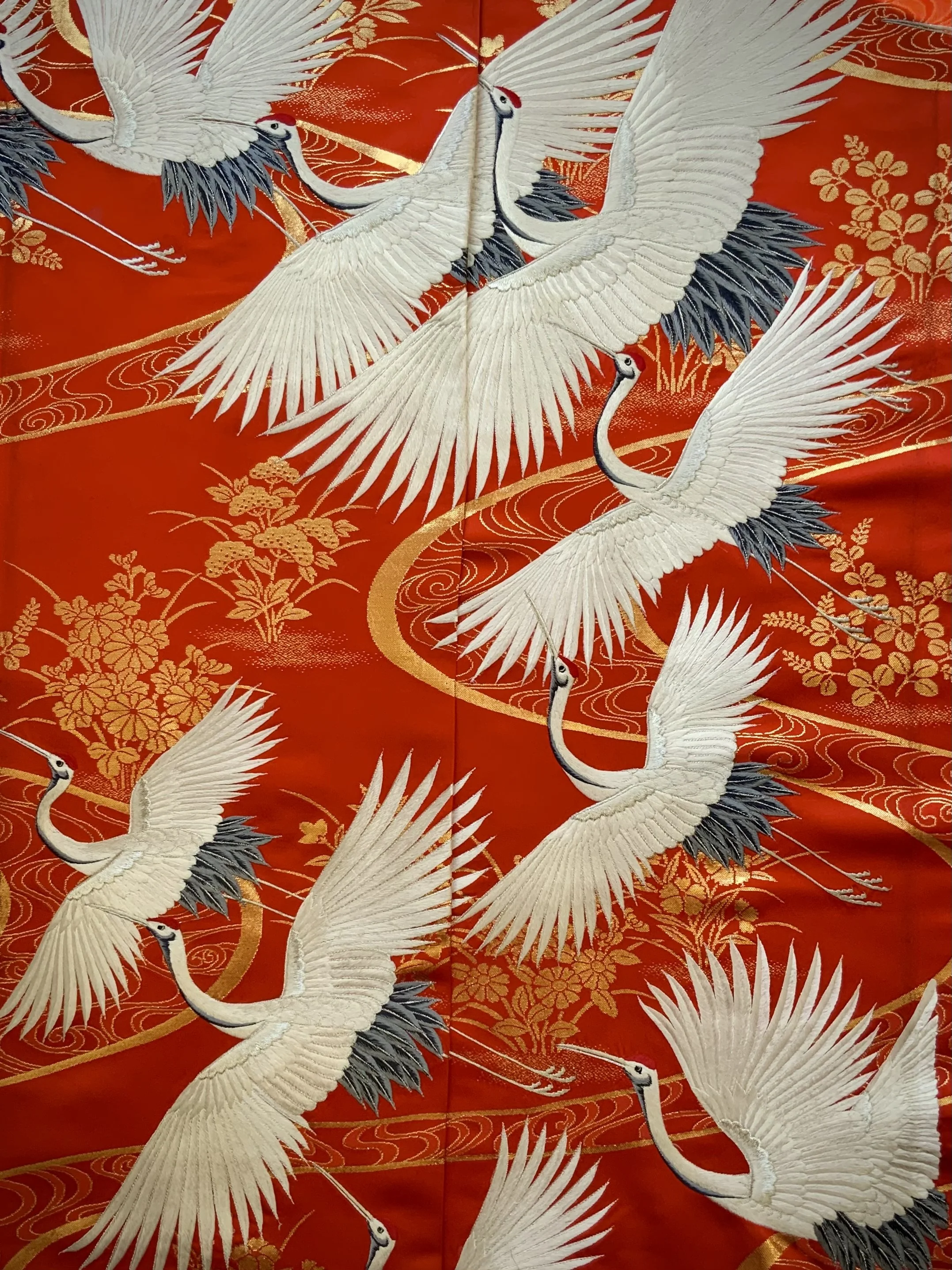 Vermillion Crane Feather baguette bag, made from vintage Japanese kimono silk, with gold hardware and Agate beaded tassel charms by Kirsty Chivers