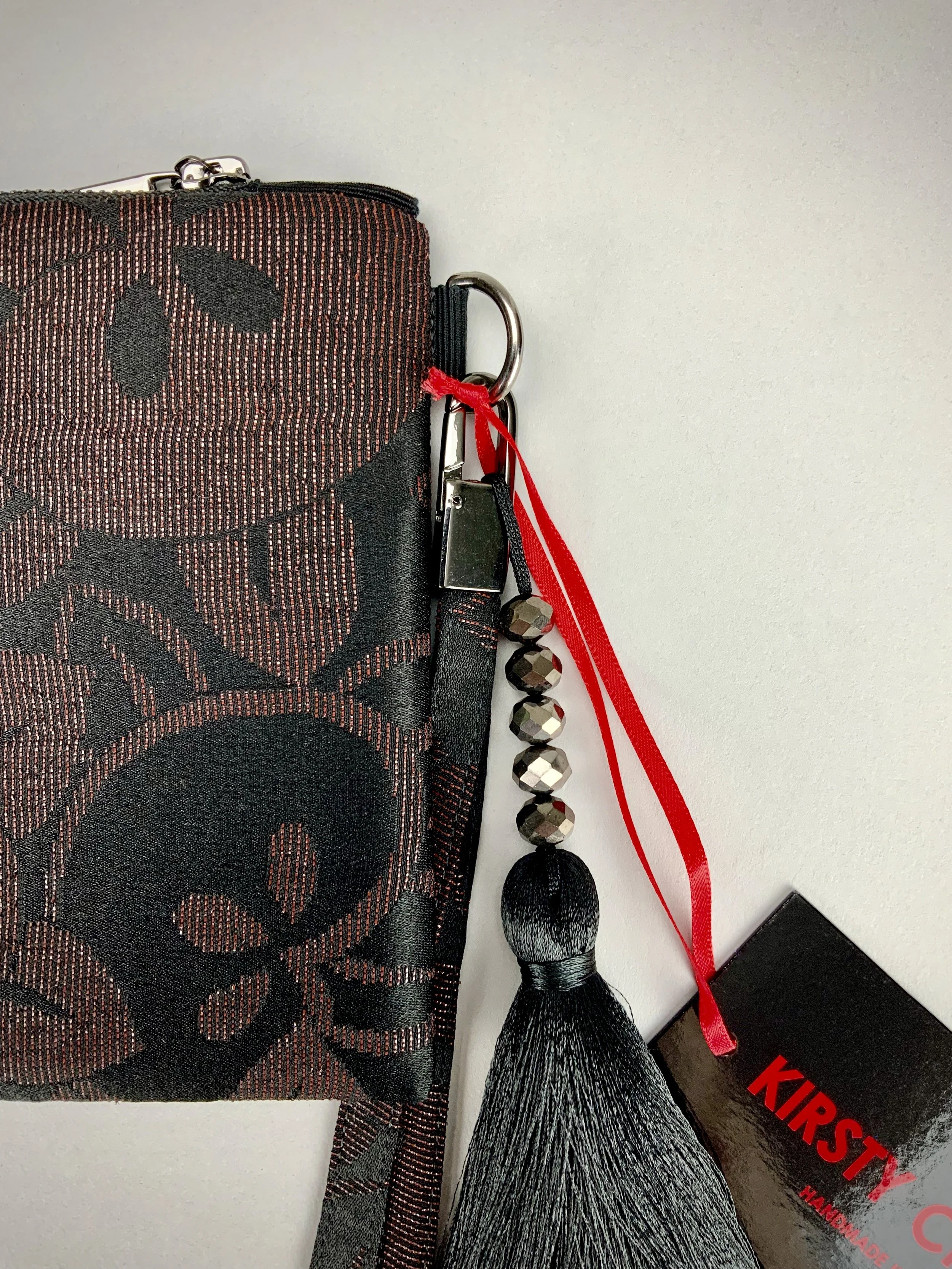 Black silk wristlet purse with glittery Persimmon fruit design & silk tassel, made from vintage Japanese kimono fabric by Kirsty Chivers